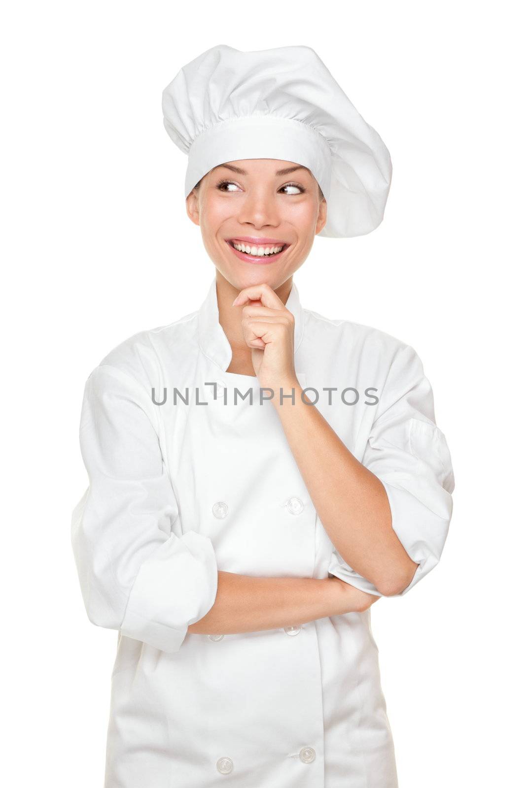 Chef thinking looking smiling and happy to the side. Woman chef, cook or baker in chef uniform and hat. Young asian female isolated on white background.