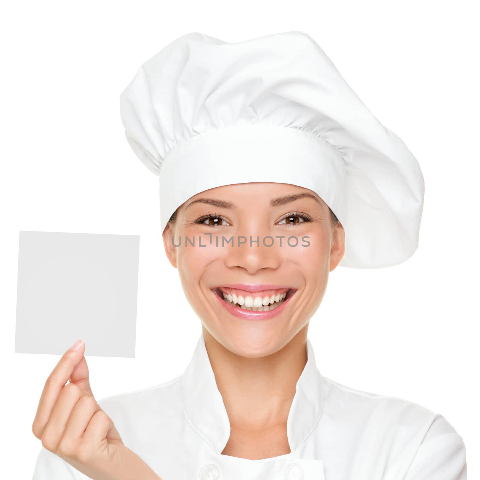 Chef, baker or cook woman showing blank sign card wearing chefs uniform and hat. Blank card for menu, gift card, offer etc. Beautiful young multicultural Asian / Caucasian female woman isolated on white background.