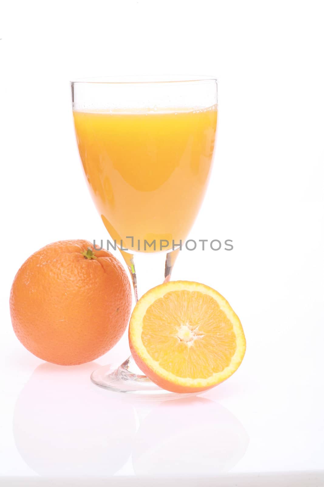 Glass of Orange juice on white background