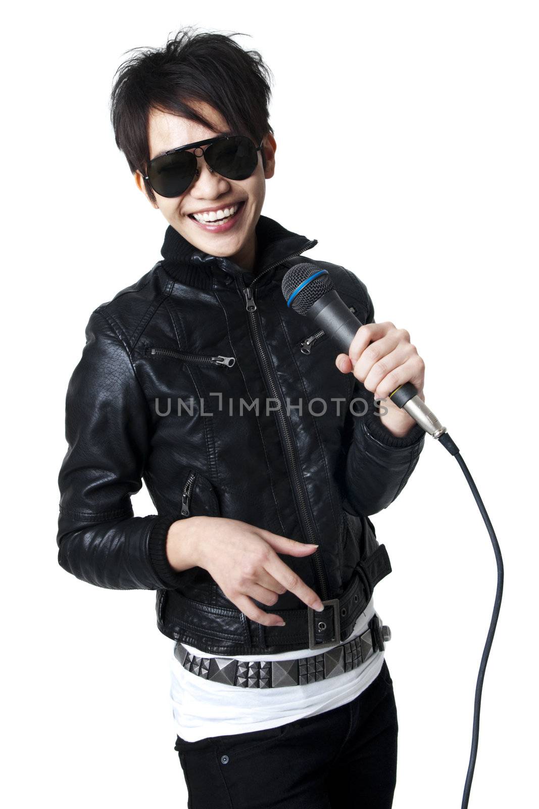 Asian rock singer in performance, isolated on white.