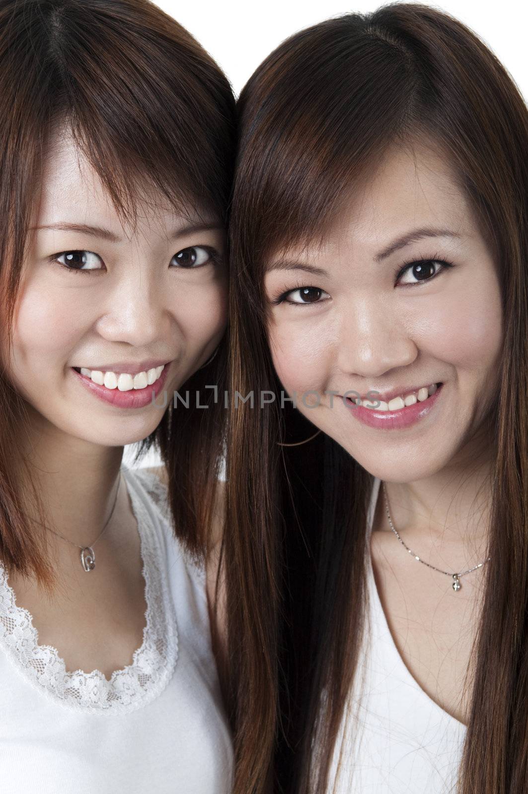 Close up cheerful Asian girls on white background.