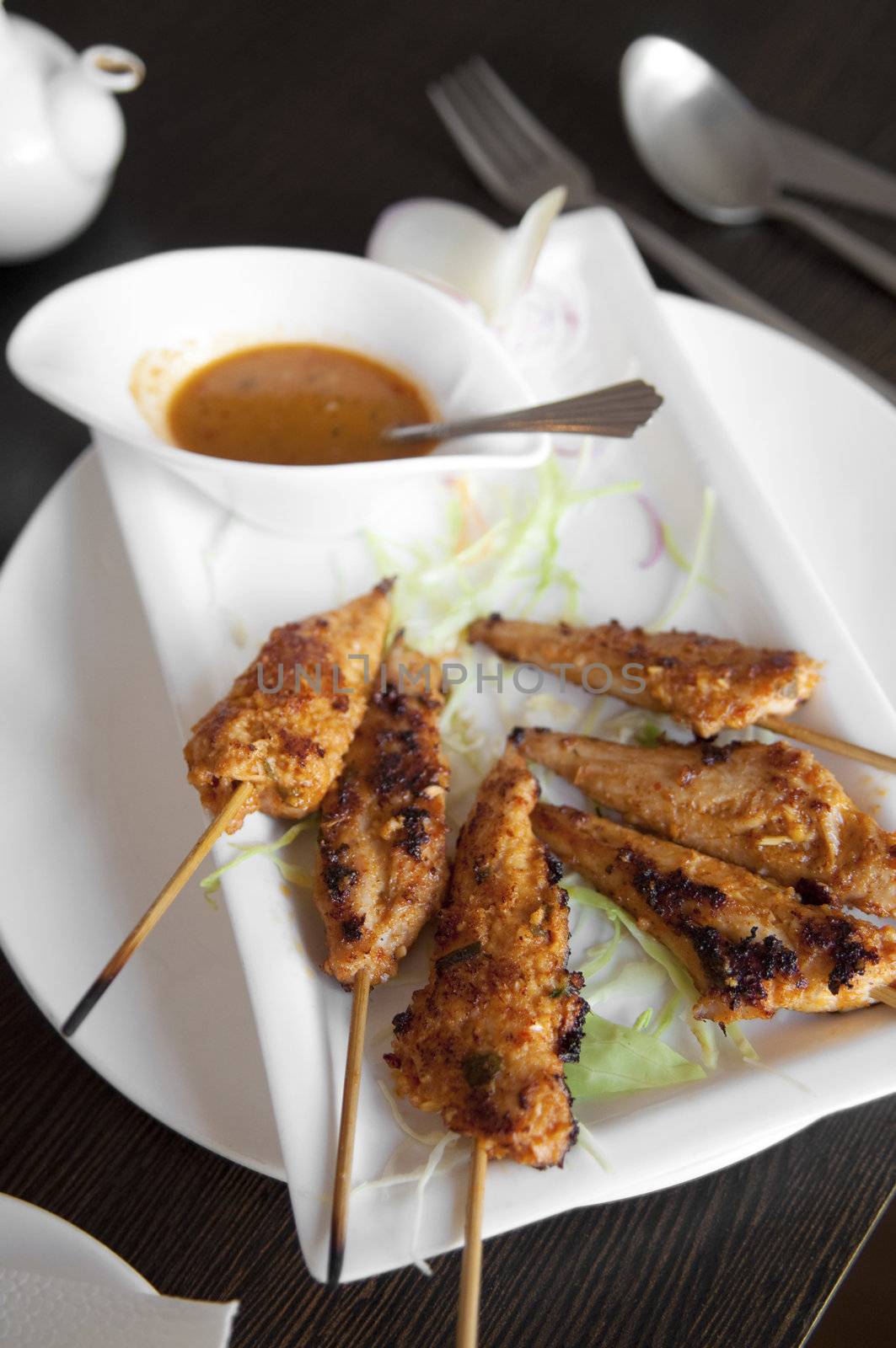 Delicious chicken satay on skewers