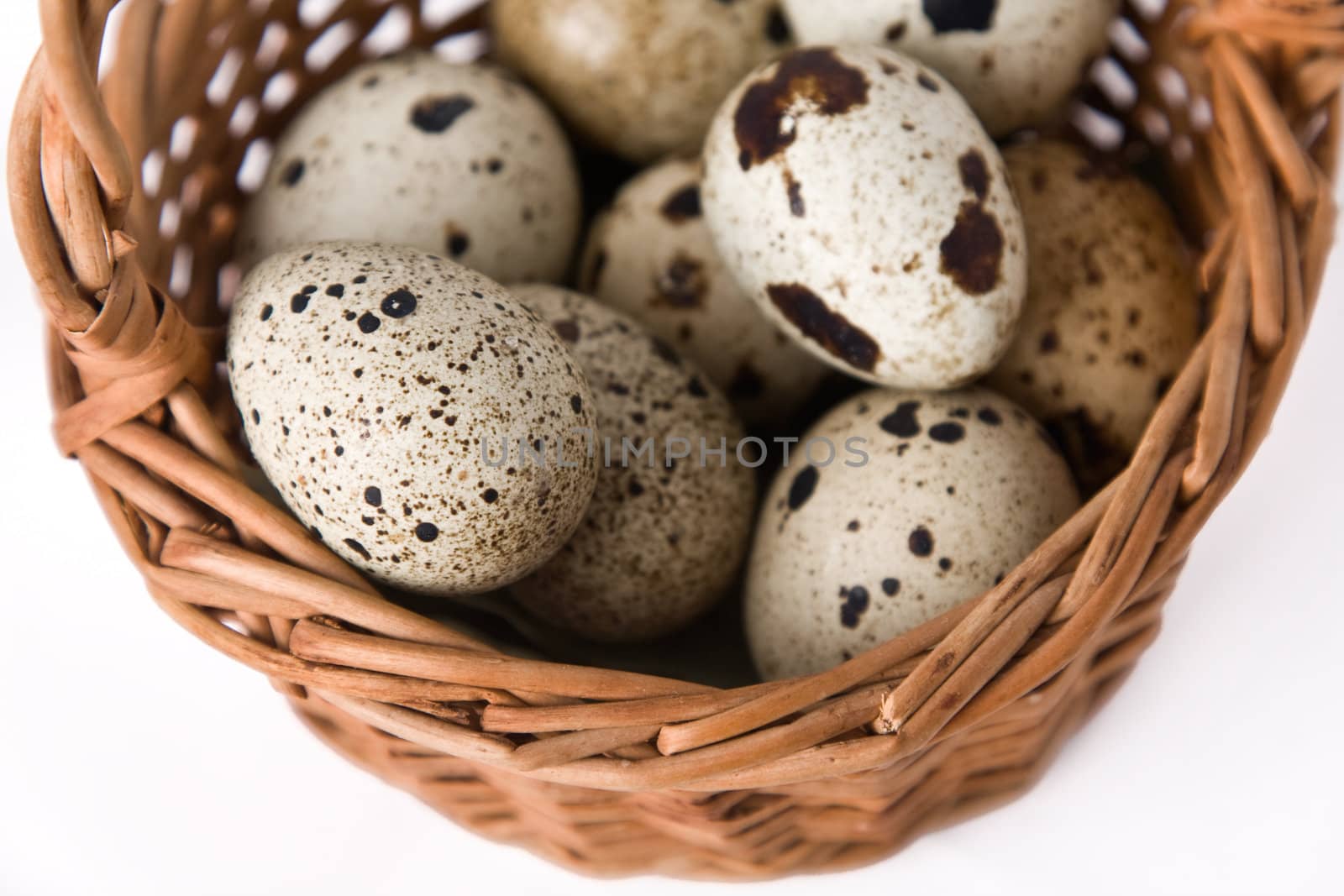 quail eggs in a basket, top view