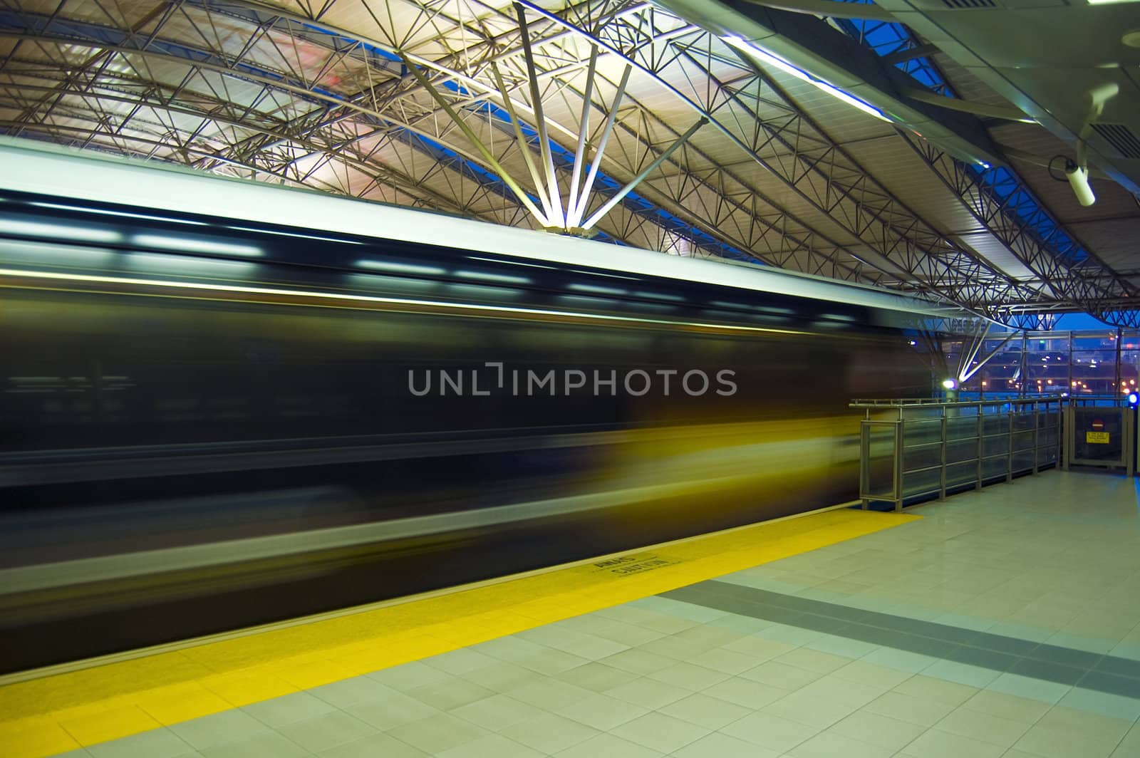 Fast train passing on railway station, Kuala Lumpur, Malaysia