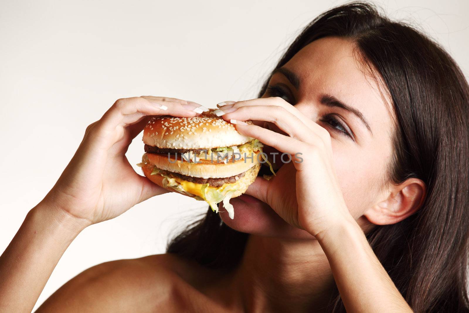 woman eat burger isolated on white background