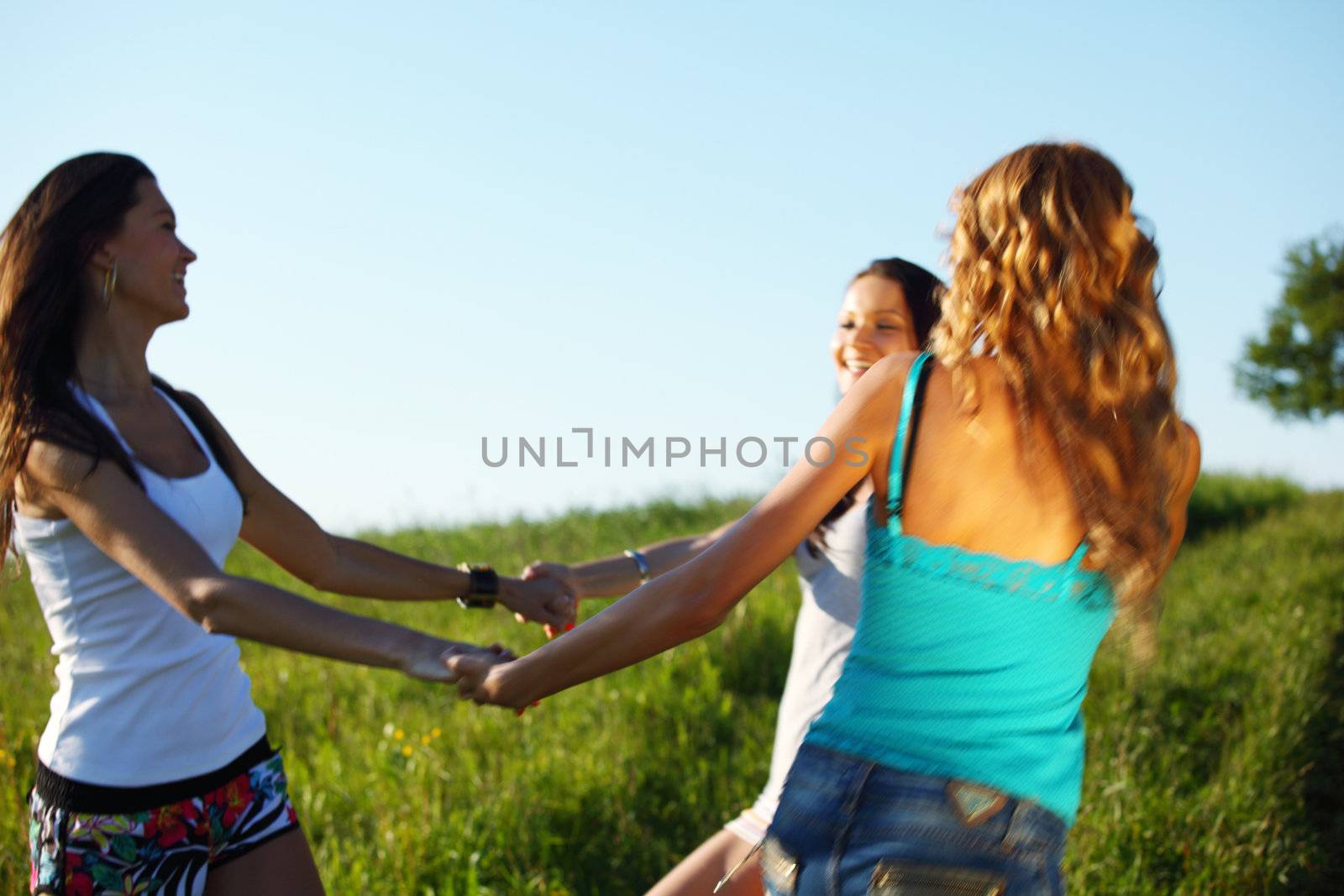 women fun on grass field