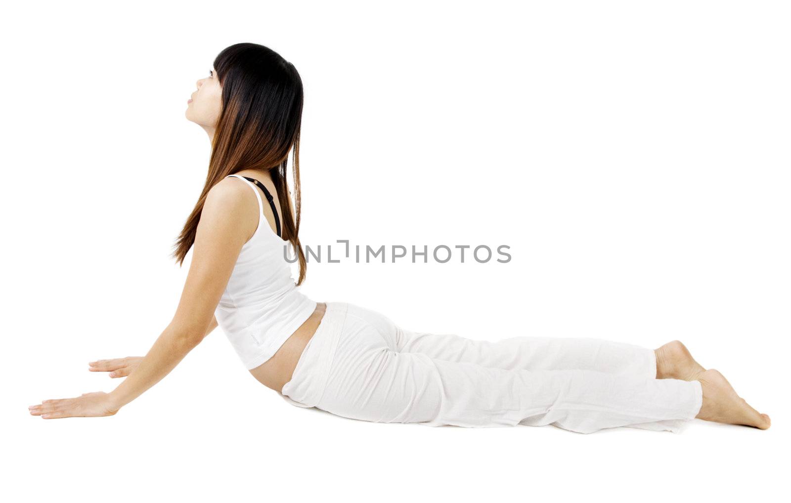 Woman in yoga, Cobra Pose, isolated on white.