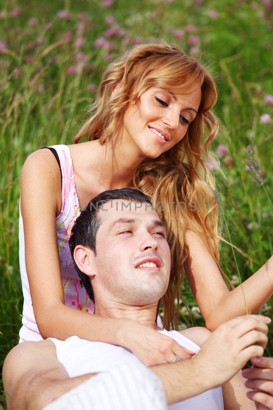 two lovers on grass field