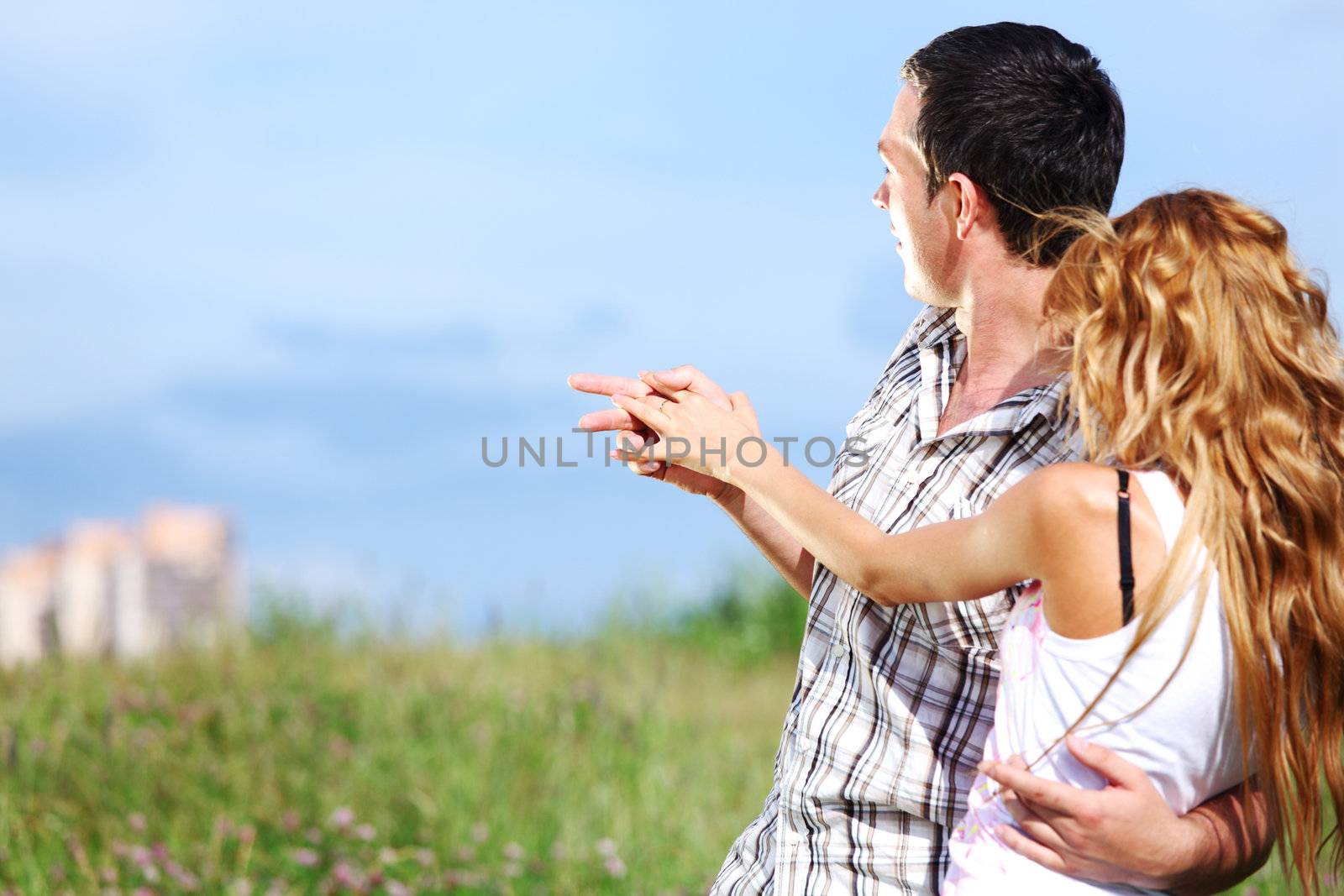 man and woman see houses and new flat