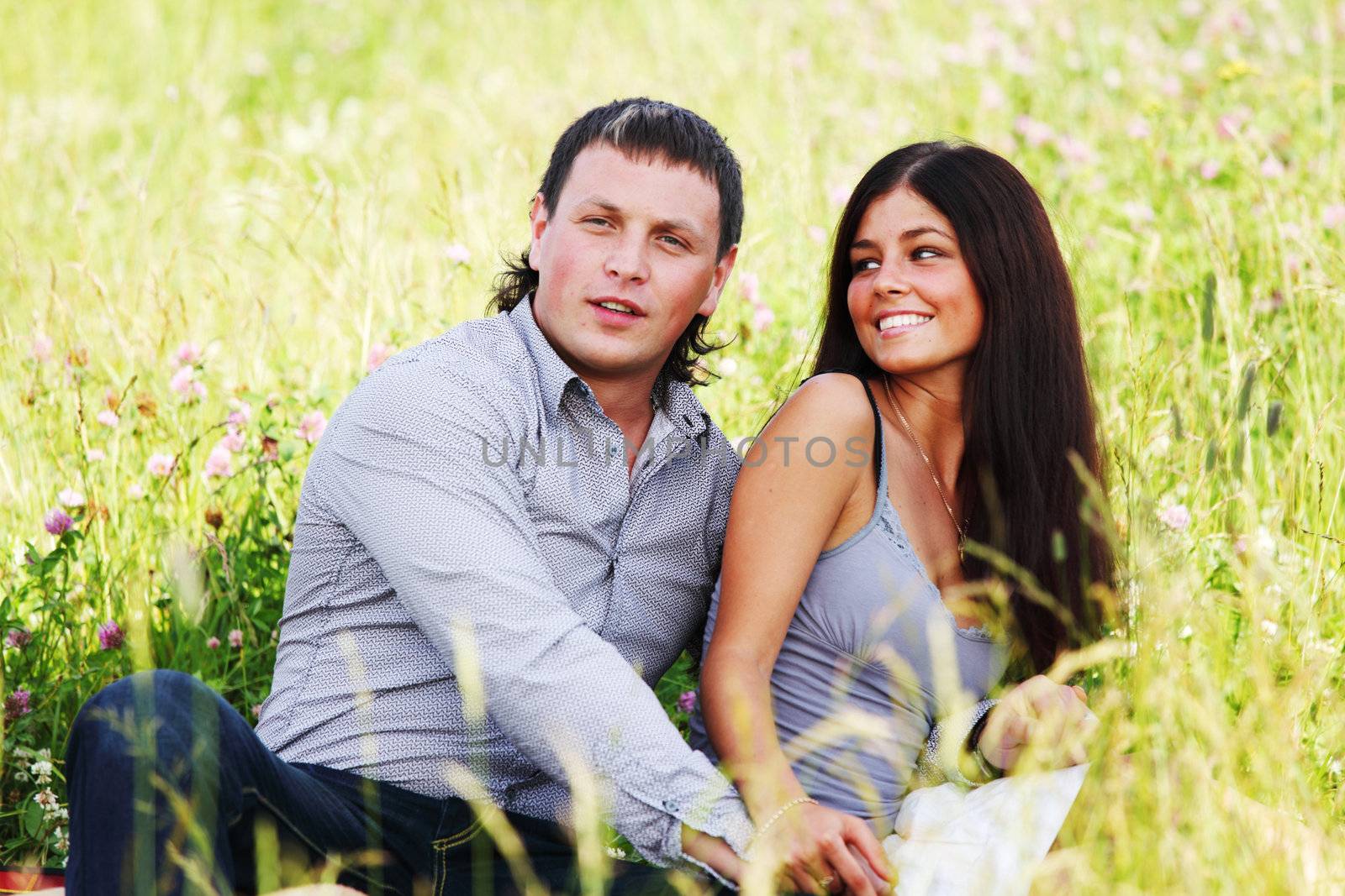 two lovers on grass field