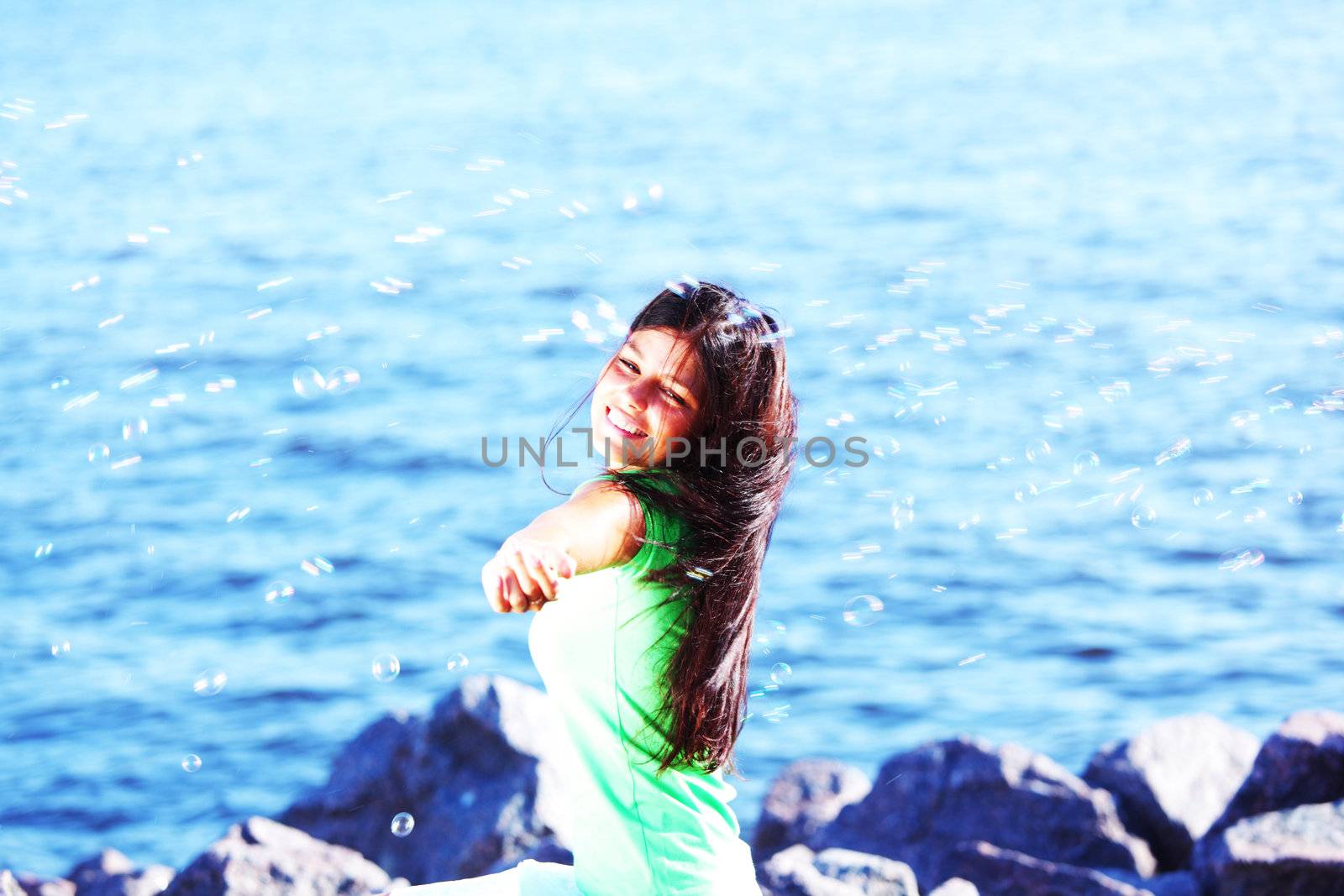 woman relax blue sea and bubbles on background