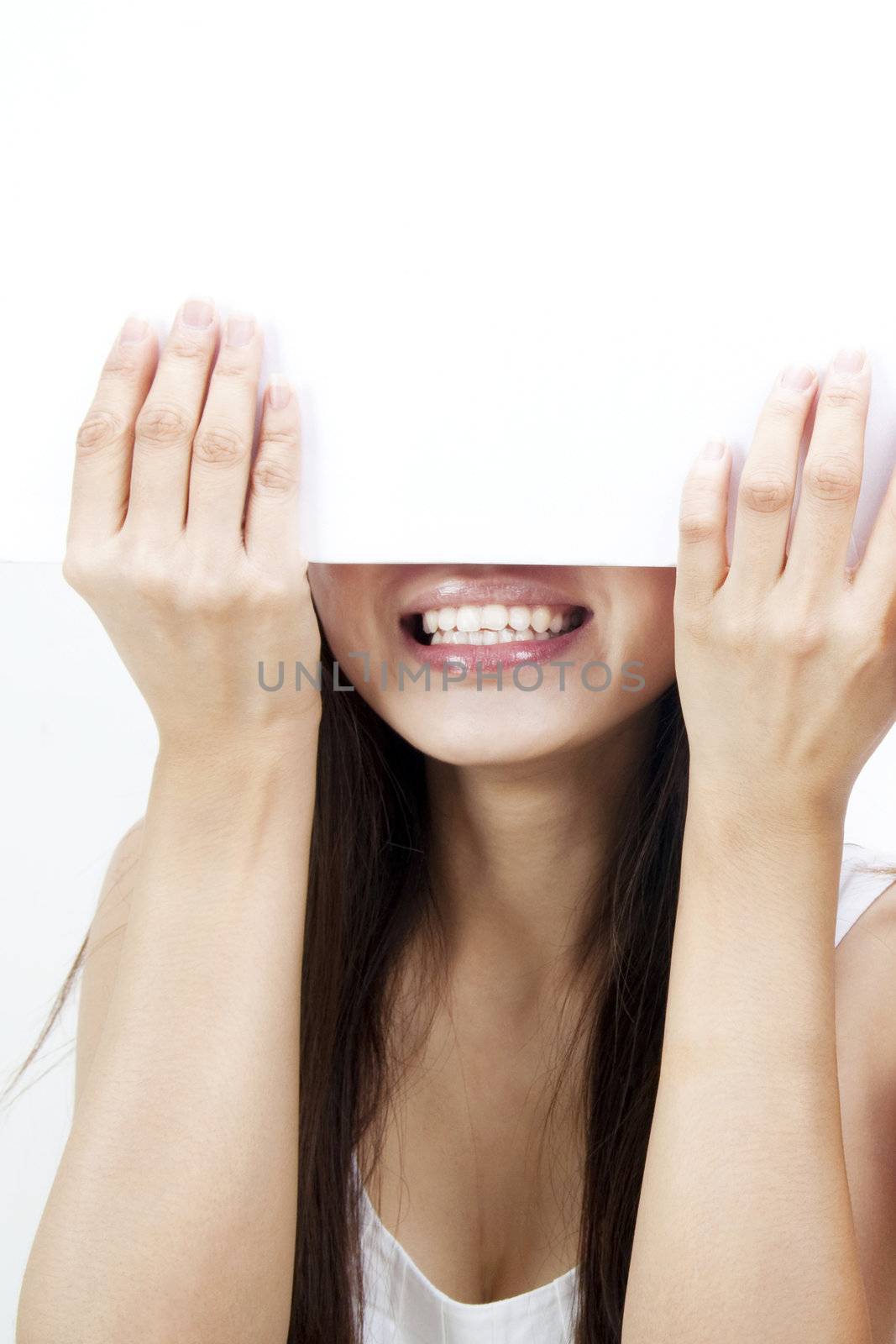 Concept photo of Asian woman holding a white card, covering her eyes.