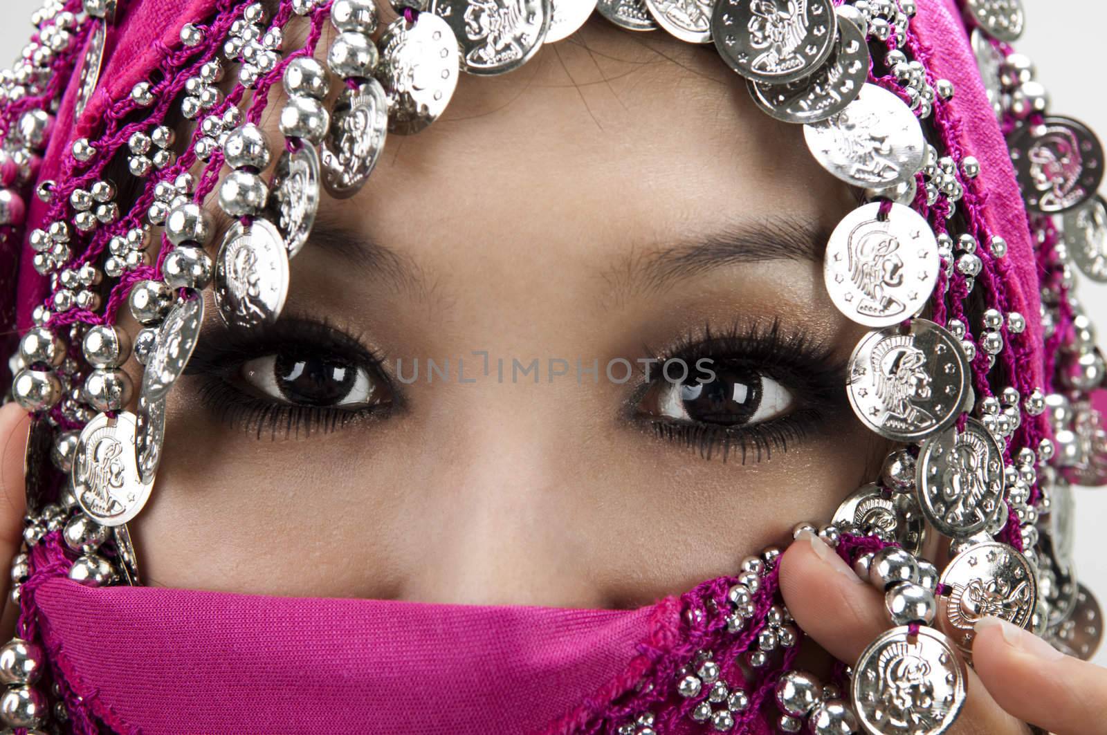 Close up picture of a Muslim woman wearing a veil