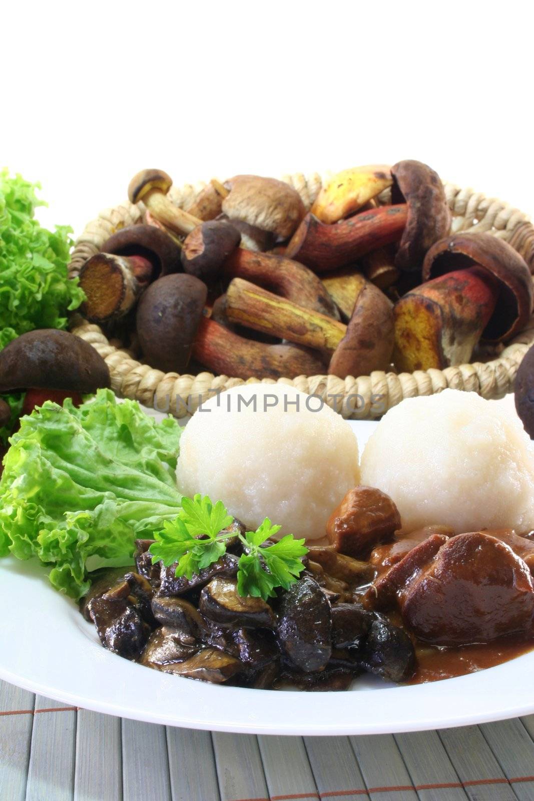 Venison goulash with dumplings and fresh wild mushrooms