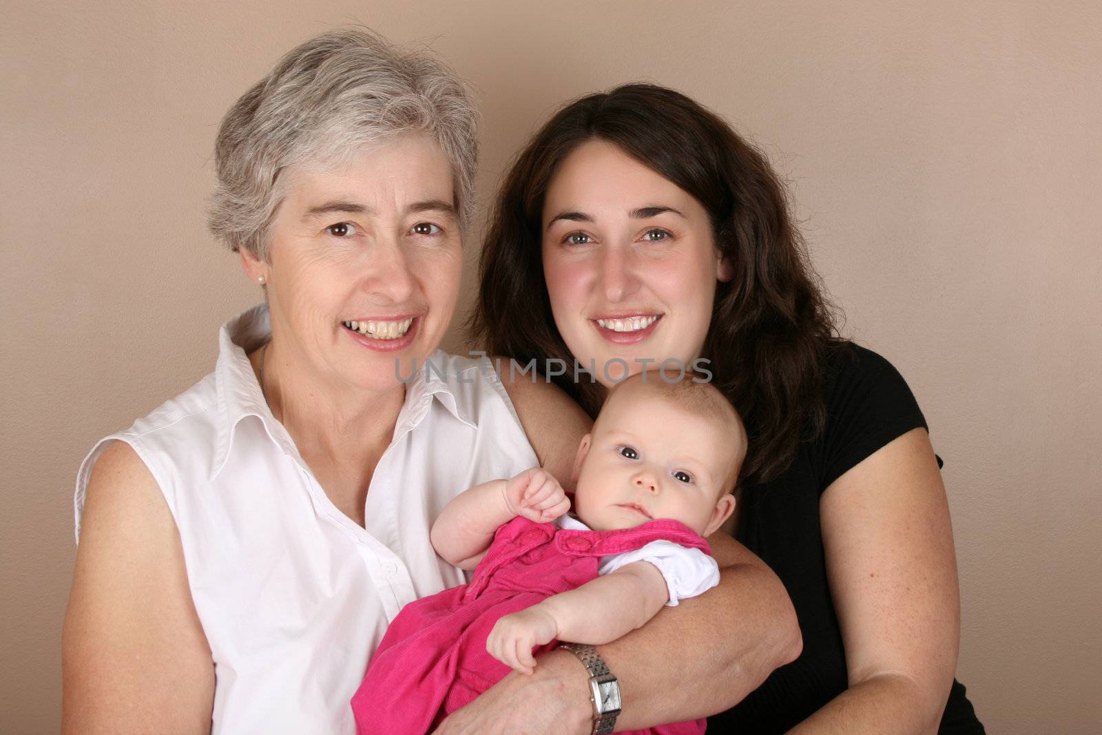 Mother, grandmother and baby girl. Three generations