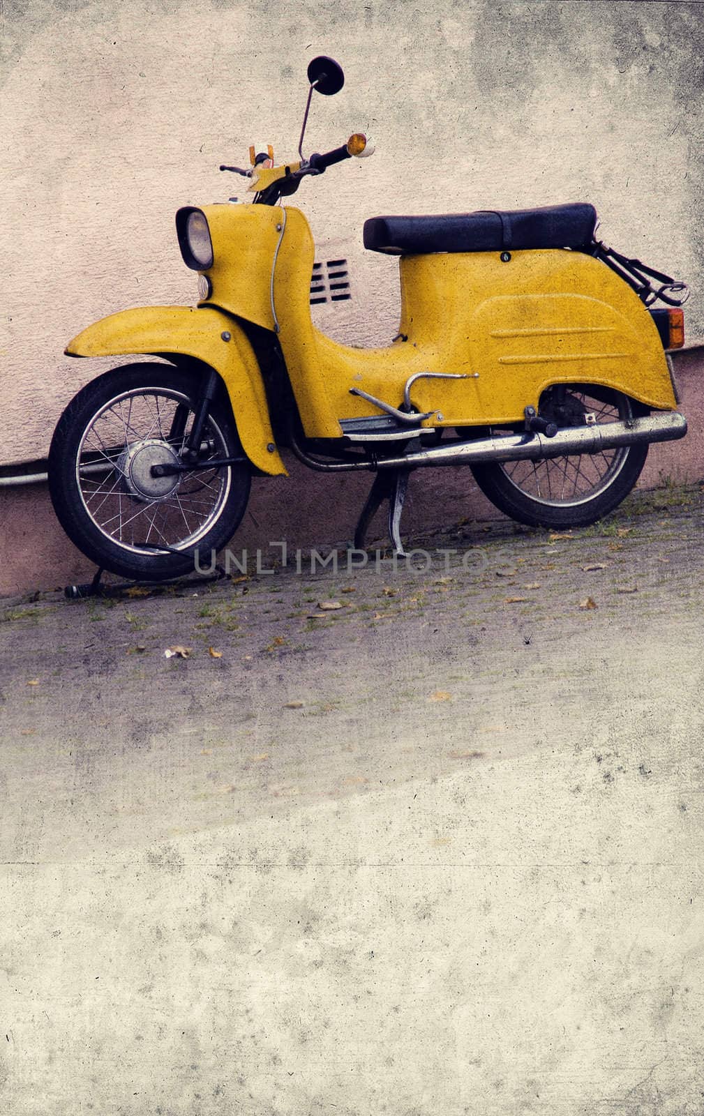 old yellow scooter in retro look design