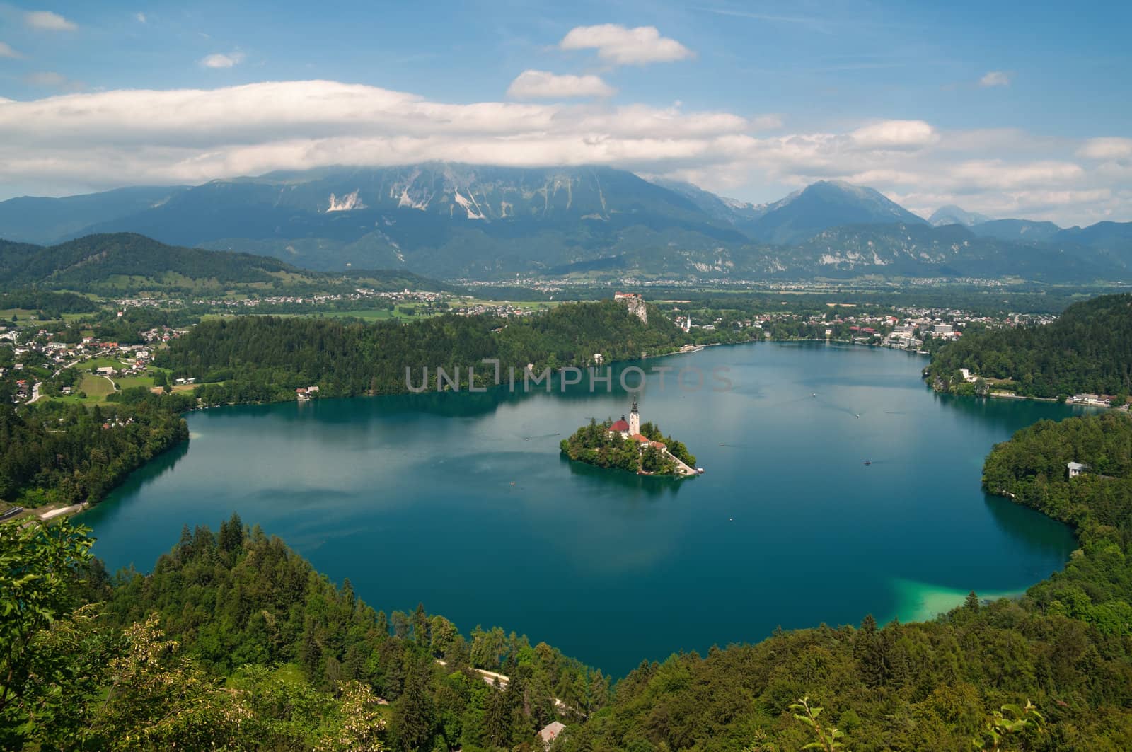 Panoramic View of  Lake Bled with St. Mary´s Church of the Assumptionon on the small island.