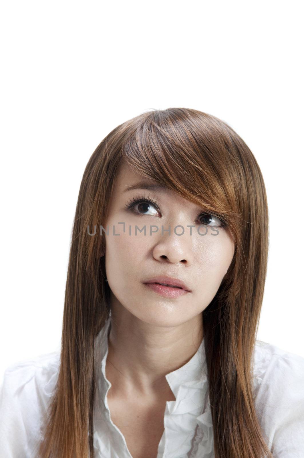 Wondering Asian girl on white background