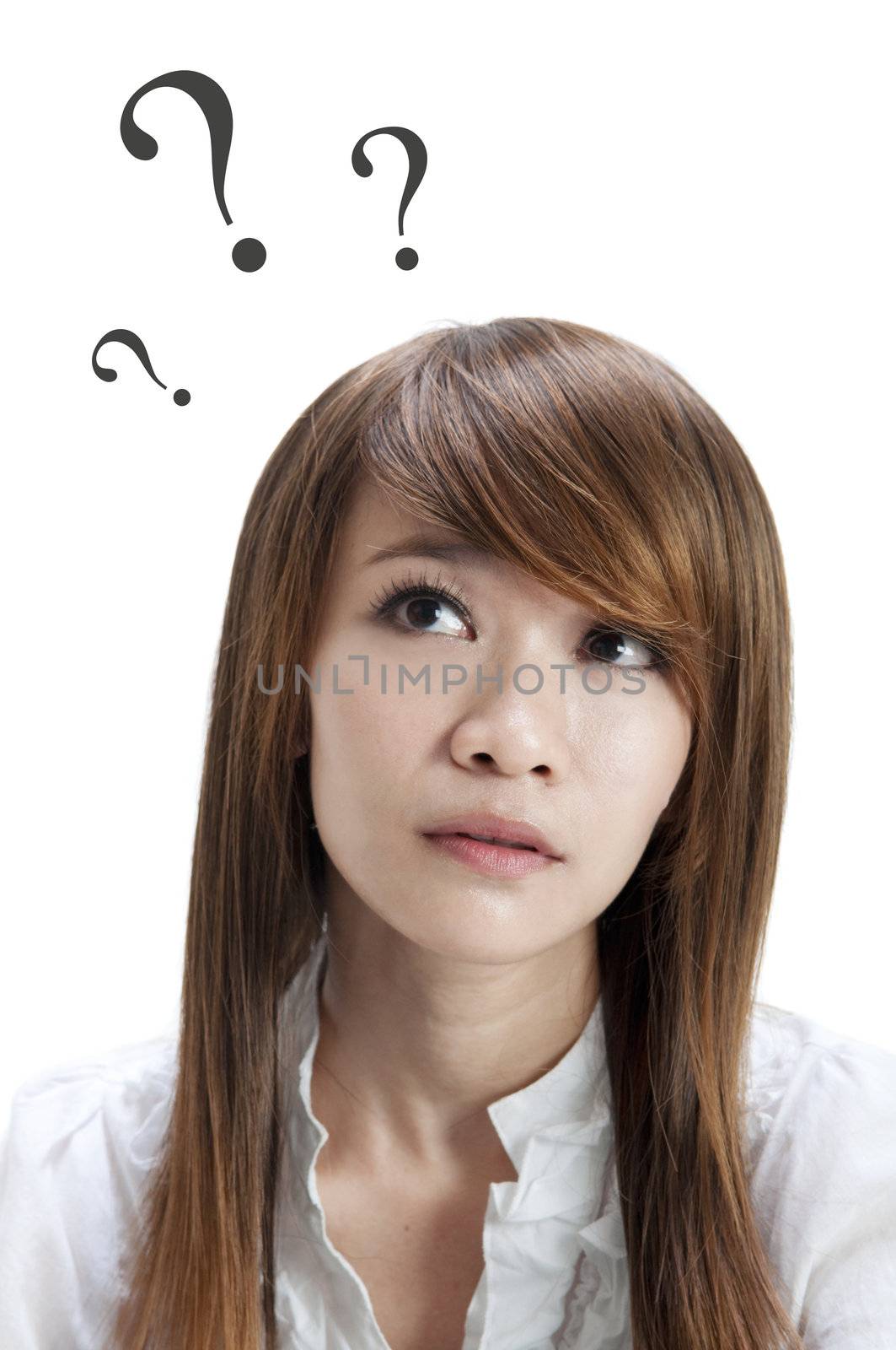 Wondering Asian girl on white background