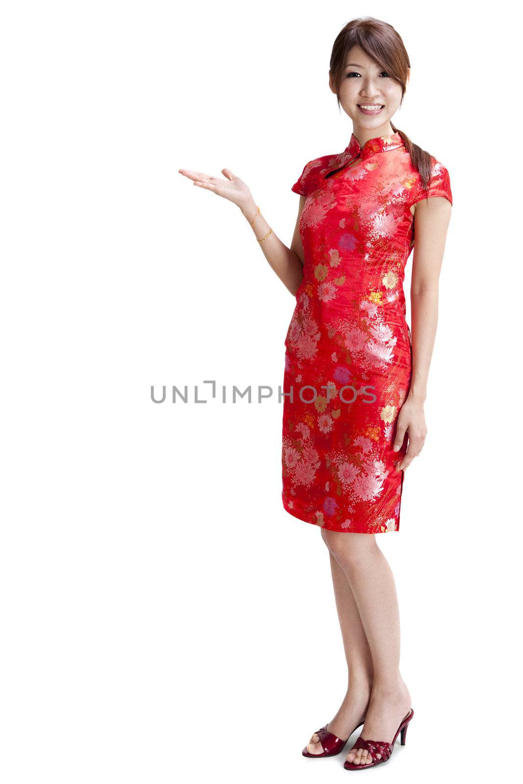 Asian Chinese woman in Traditional Chinese Cheongsam gesturing