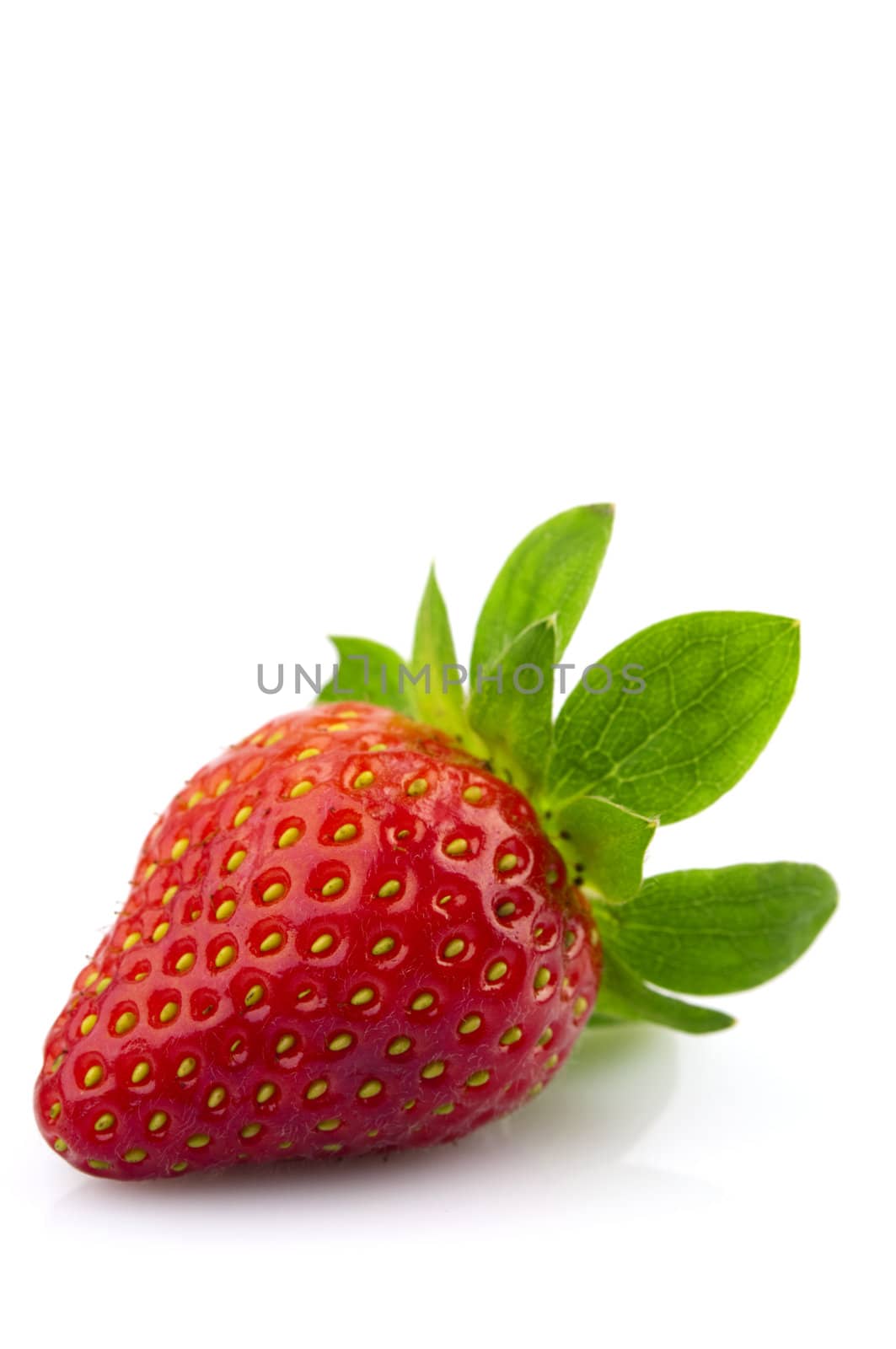 A sweet strawberry isolated on white background.