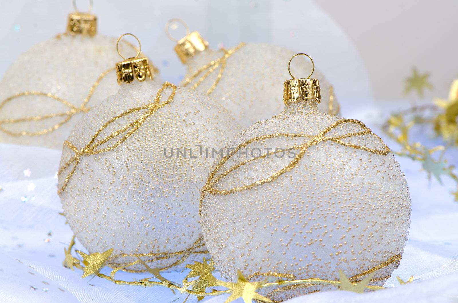 Christmas ball baubles with silver and gold decoration.
