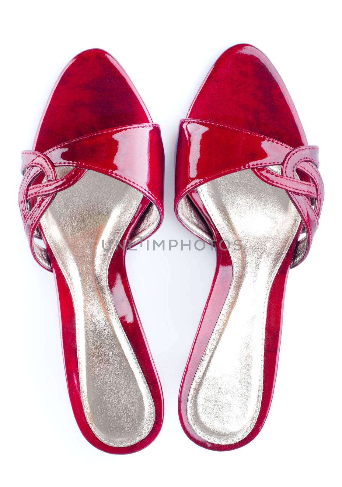 Pair of high heel red female shoes isolated on white background. 