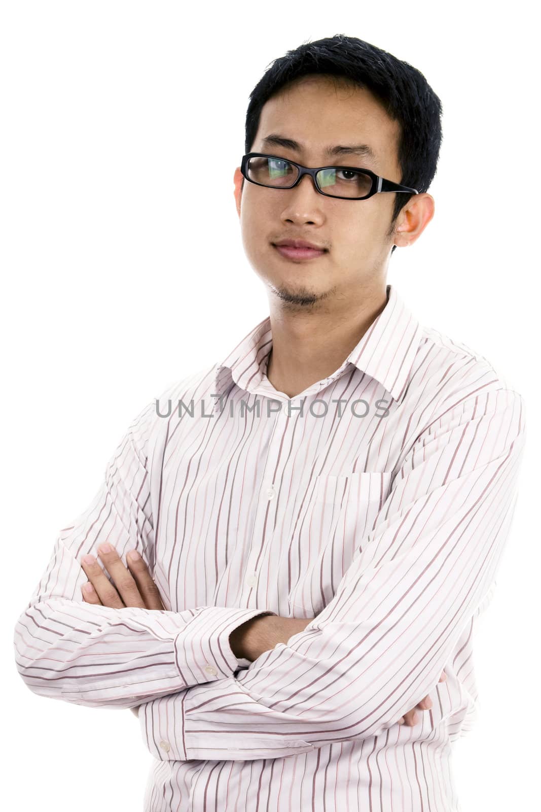 Young Asian executive arms crossed isolated on white.