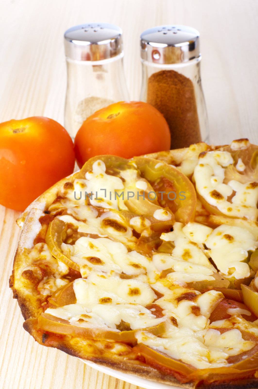 Fresh Margharita Pizza on dining table