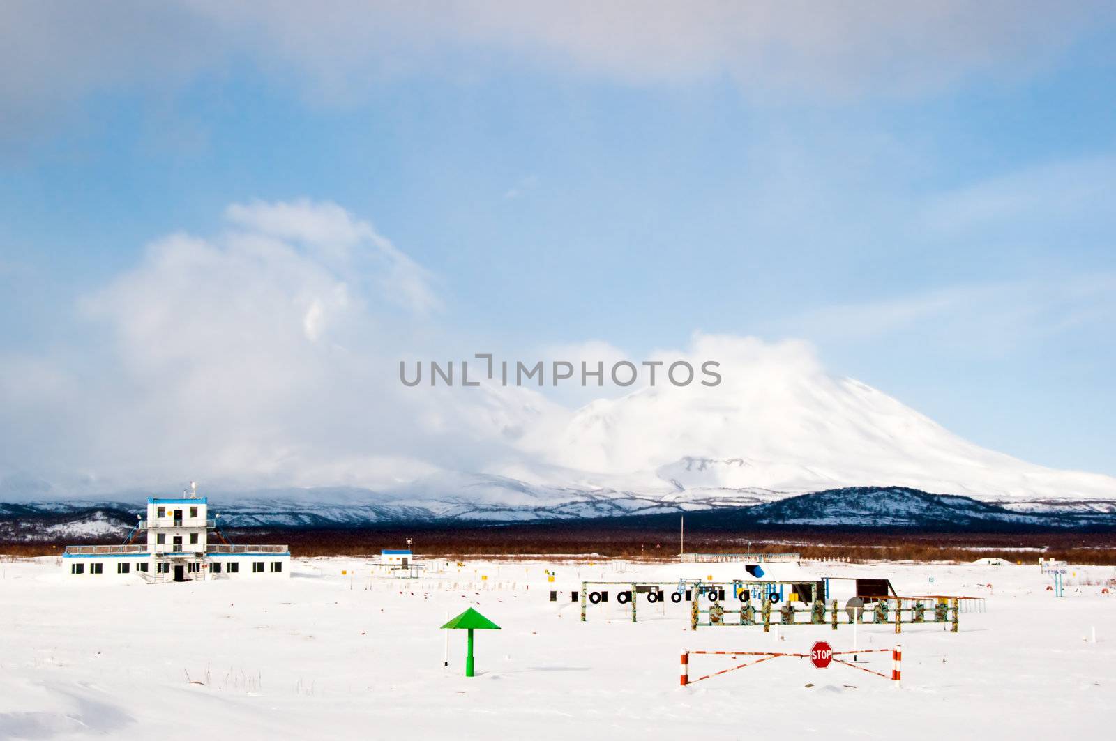 Military training base against a volcano in Russia