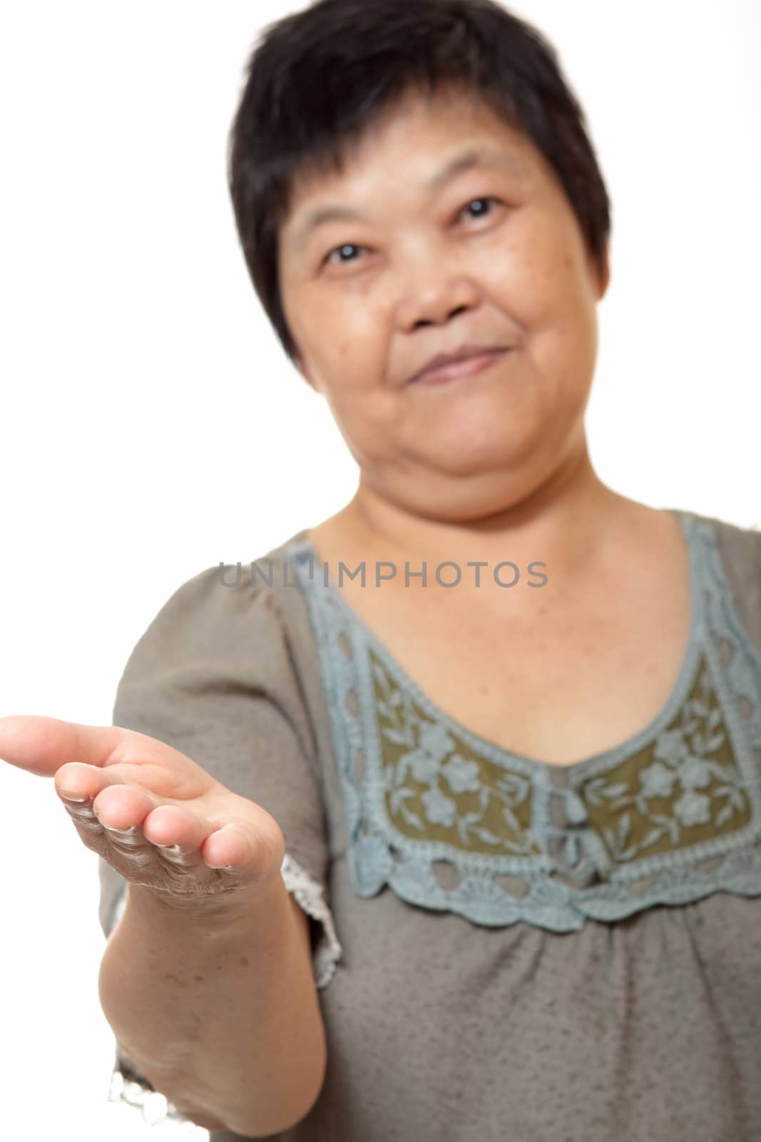 Young Asian woman hand showing blank sign 