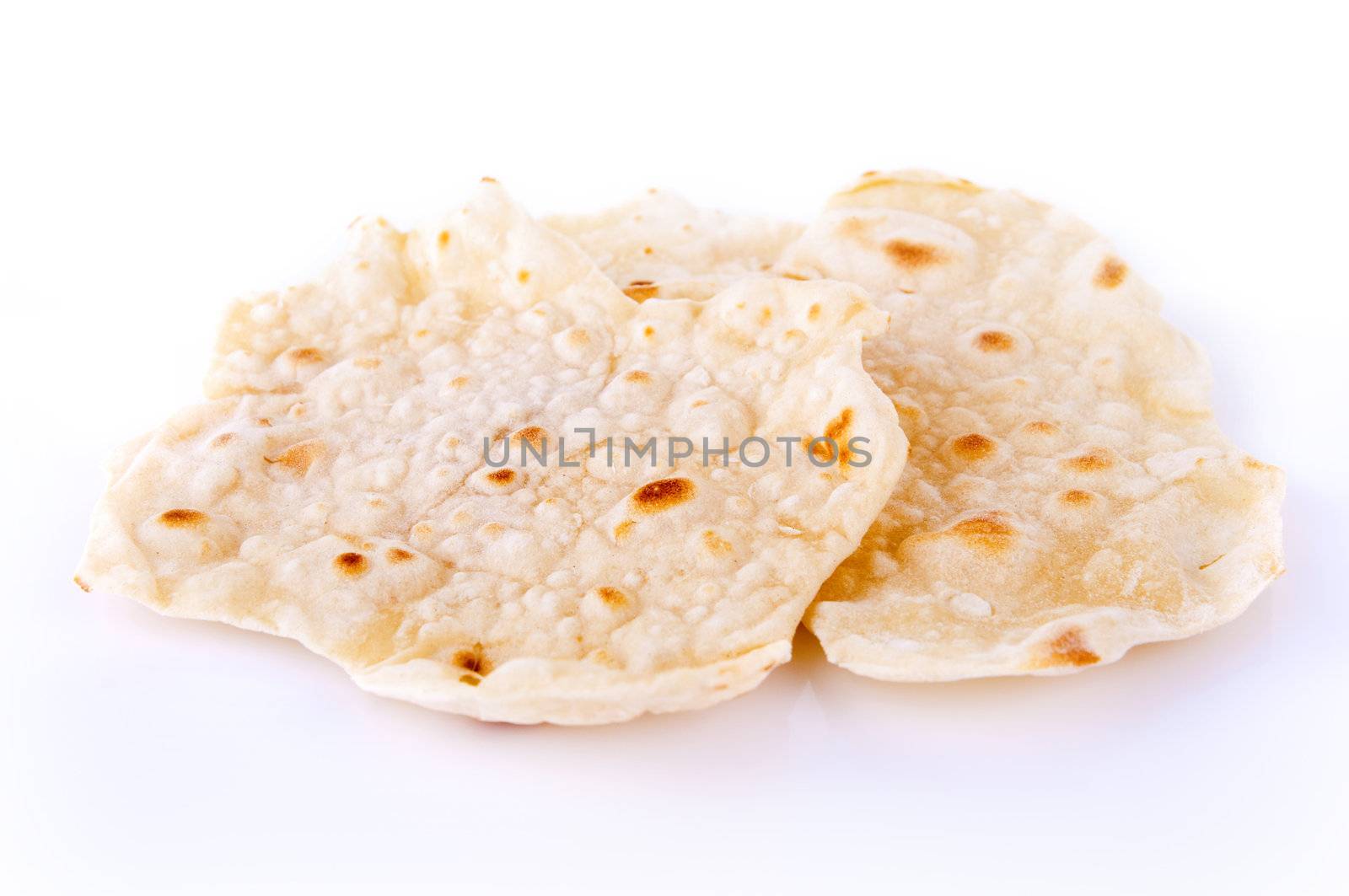 Indian staple food made of wheat flour, traditional unleavened bread to eat with curry.