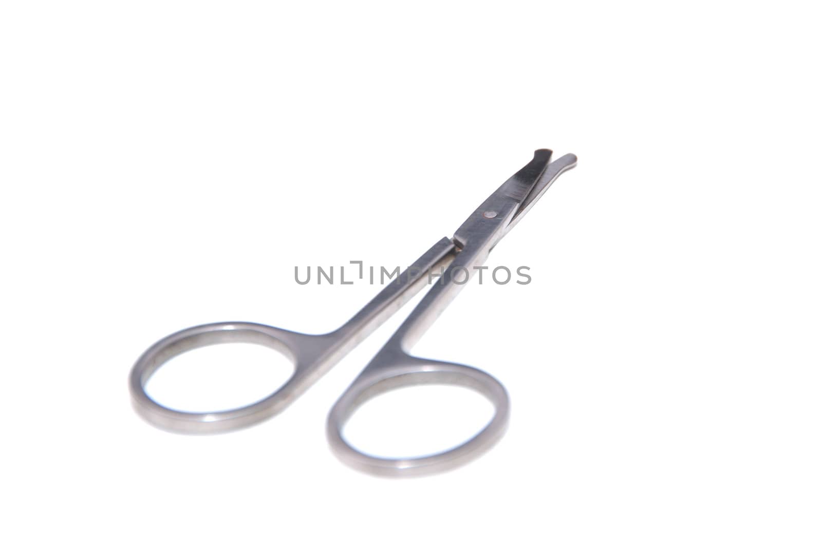 Stainless steel scissors on isolated white background