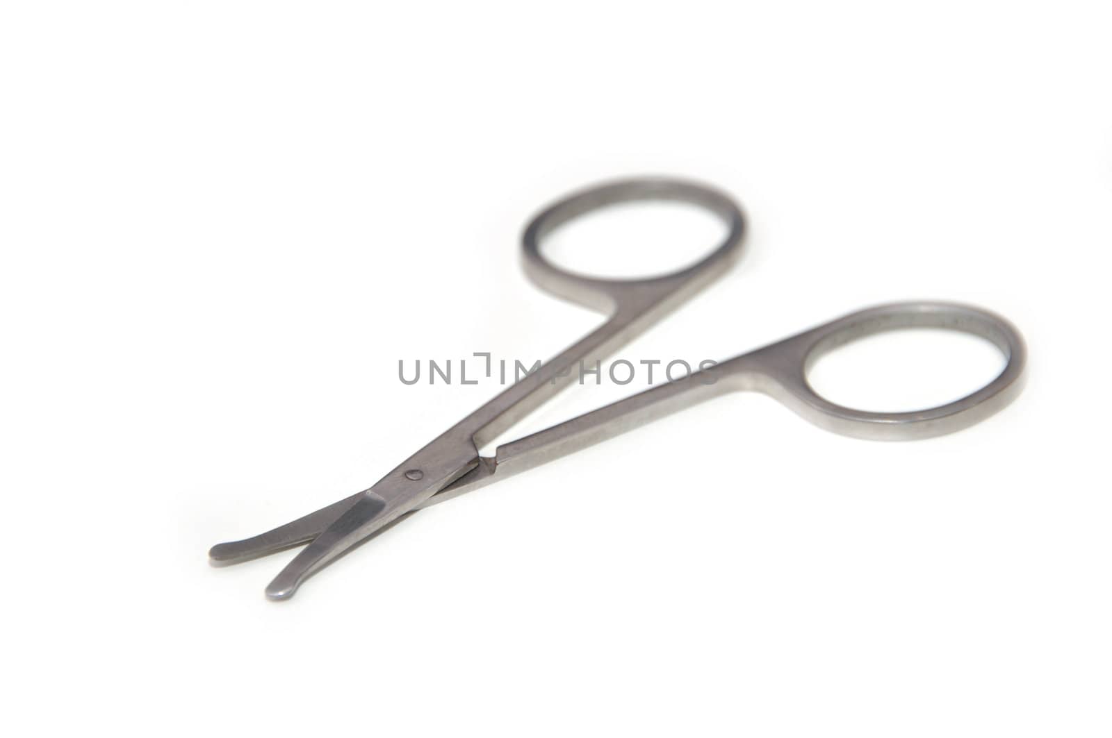 Stainless steel scissors on isolated white background