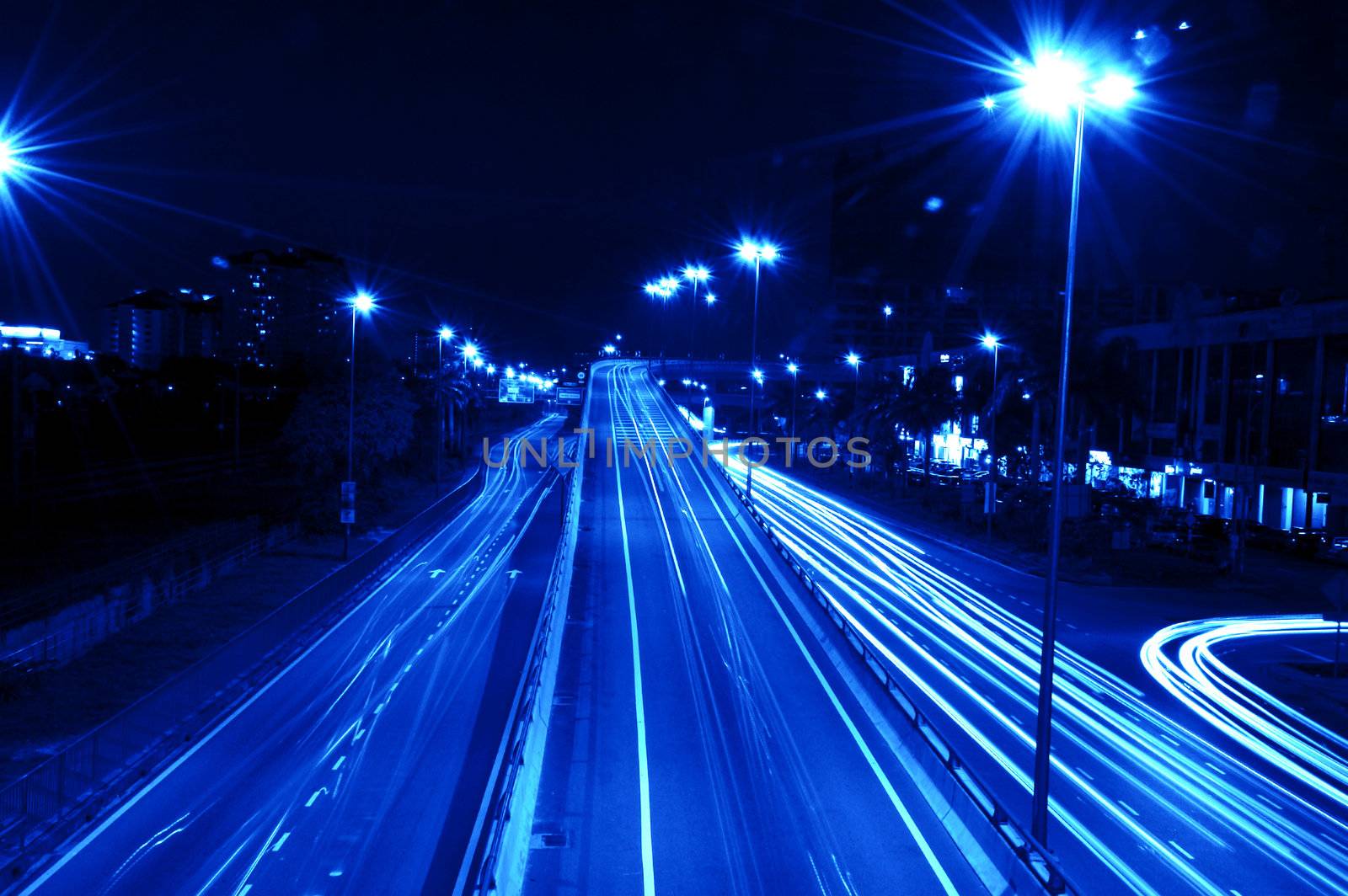 Long exposure of urban night traffics in dusk. 