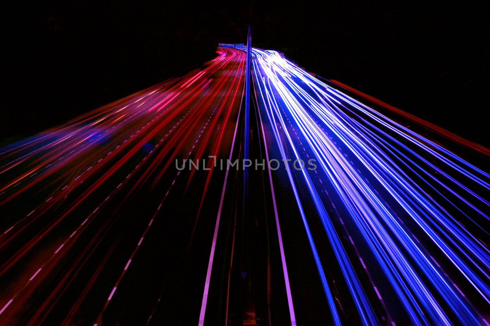 Long exposure of urban night traffics in dusk. 