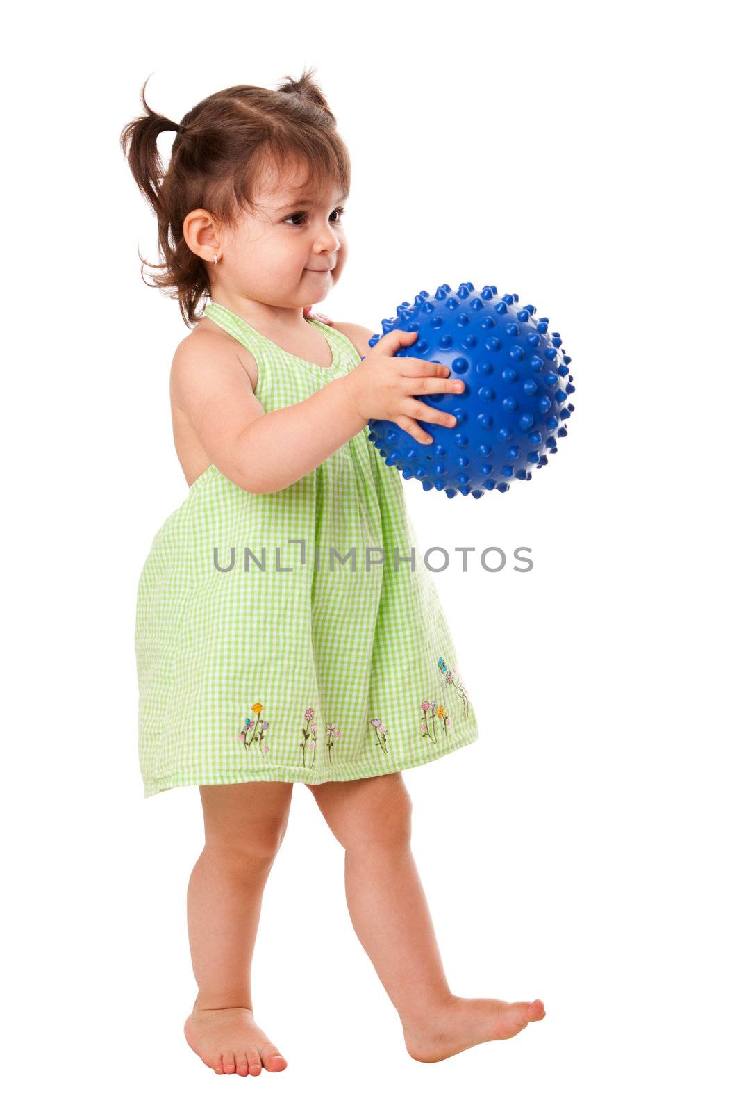 Happy toddler girl with ball by phakimata