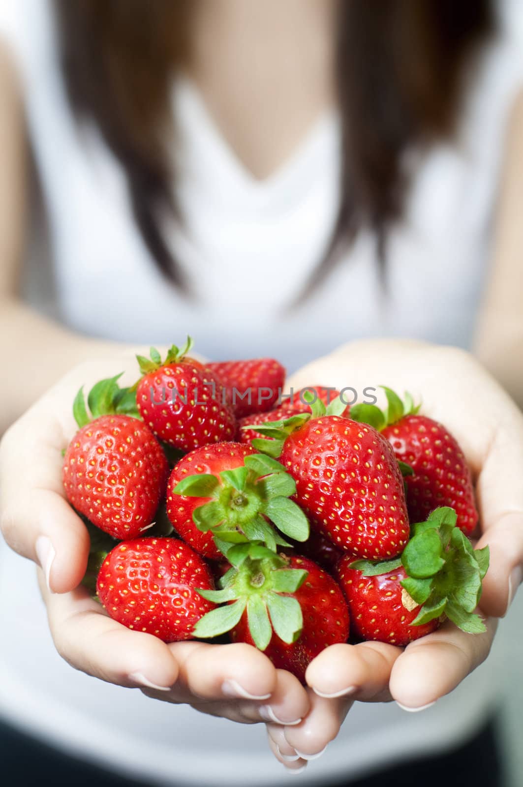 Many fresh strawberries on hand.