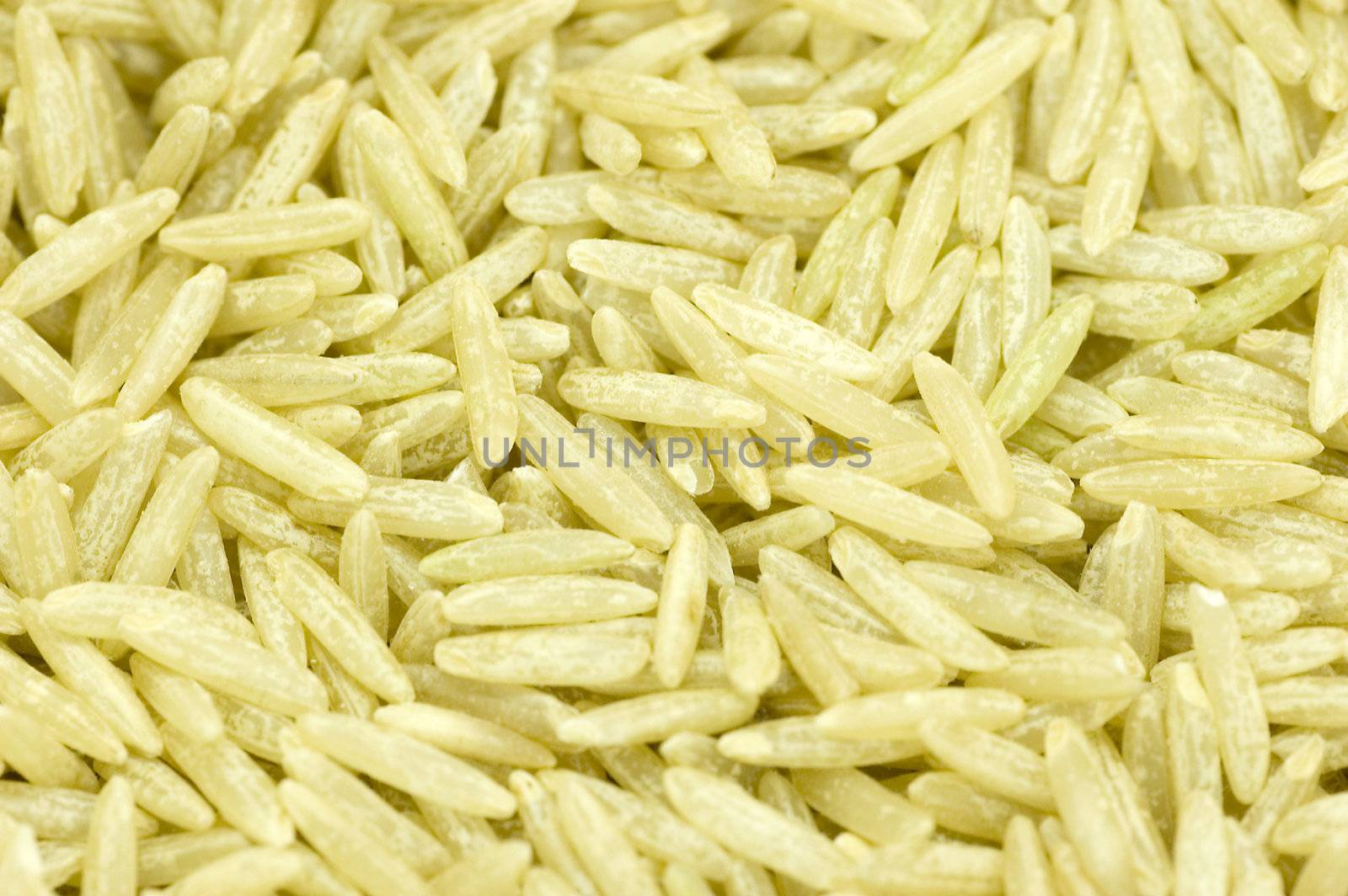 Uncooked dry brown Basmati rice, originates from India's Basmati seeds. 