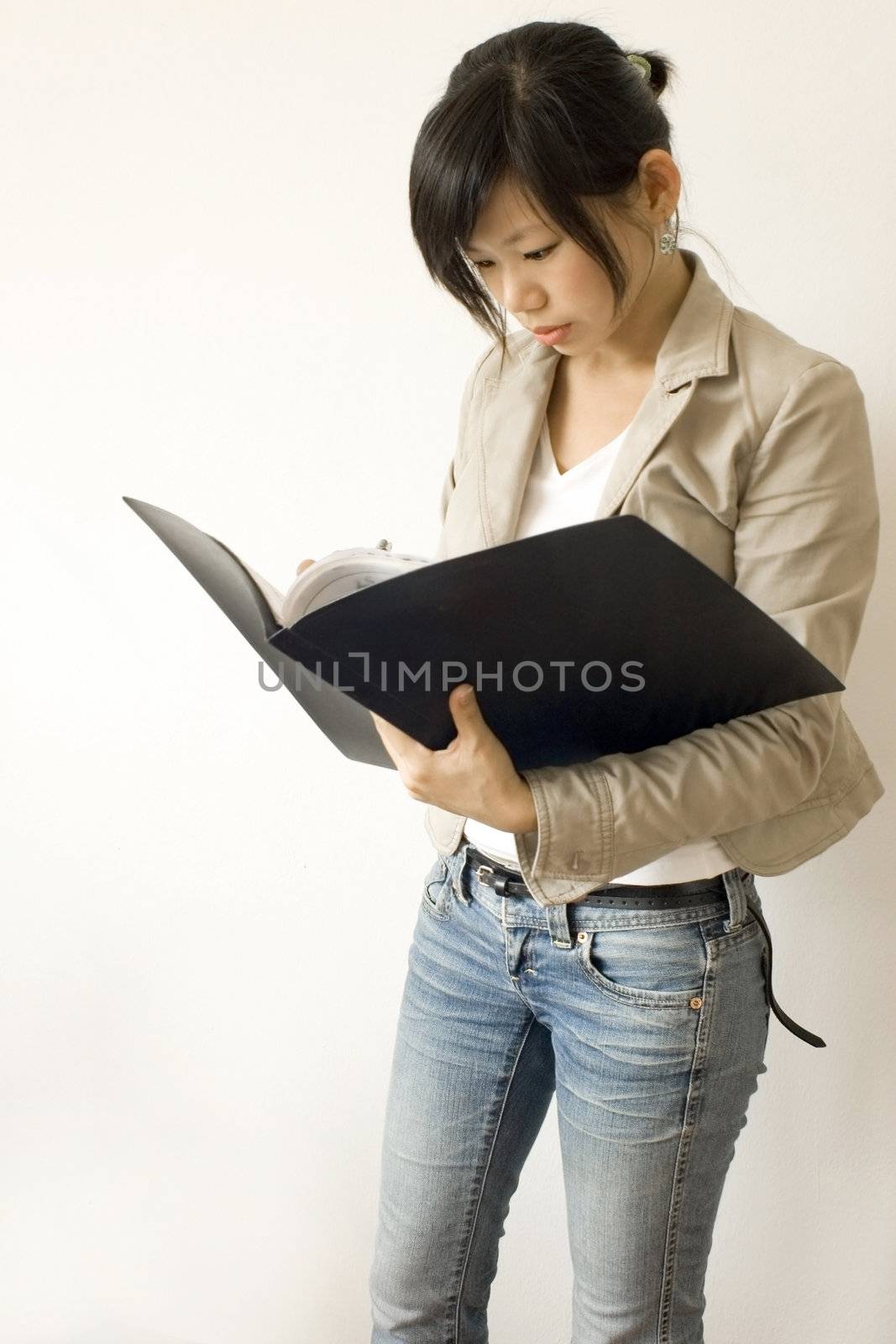 Education/business women reading on document 
