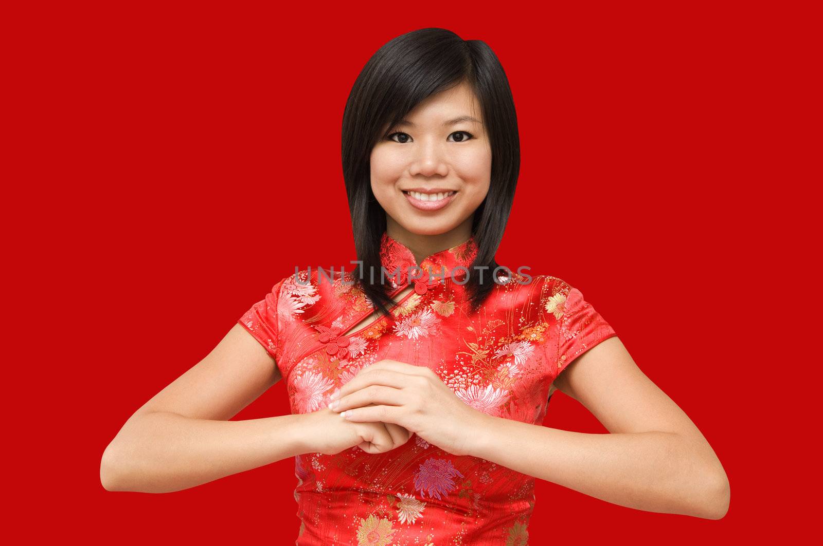 Oriental girl wishing you a happy chinese new year 
