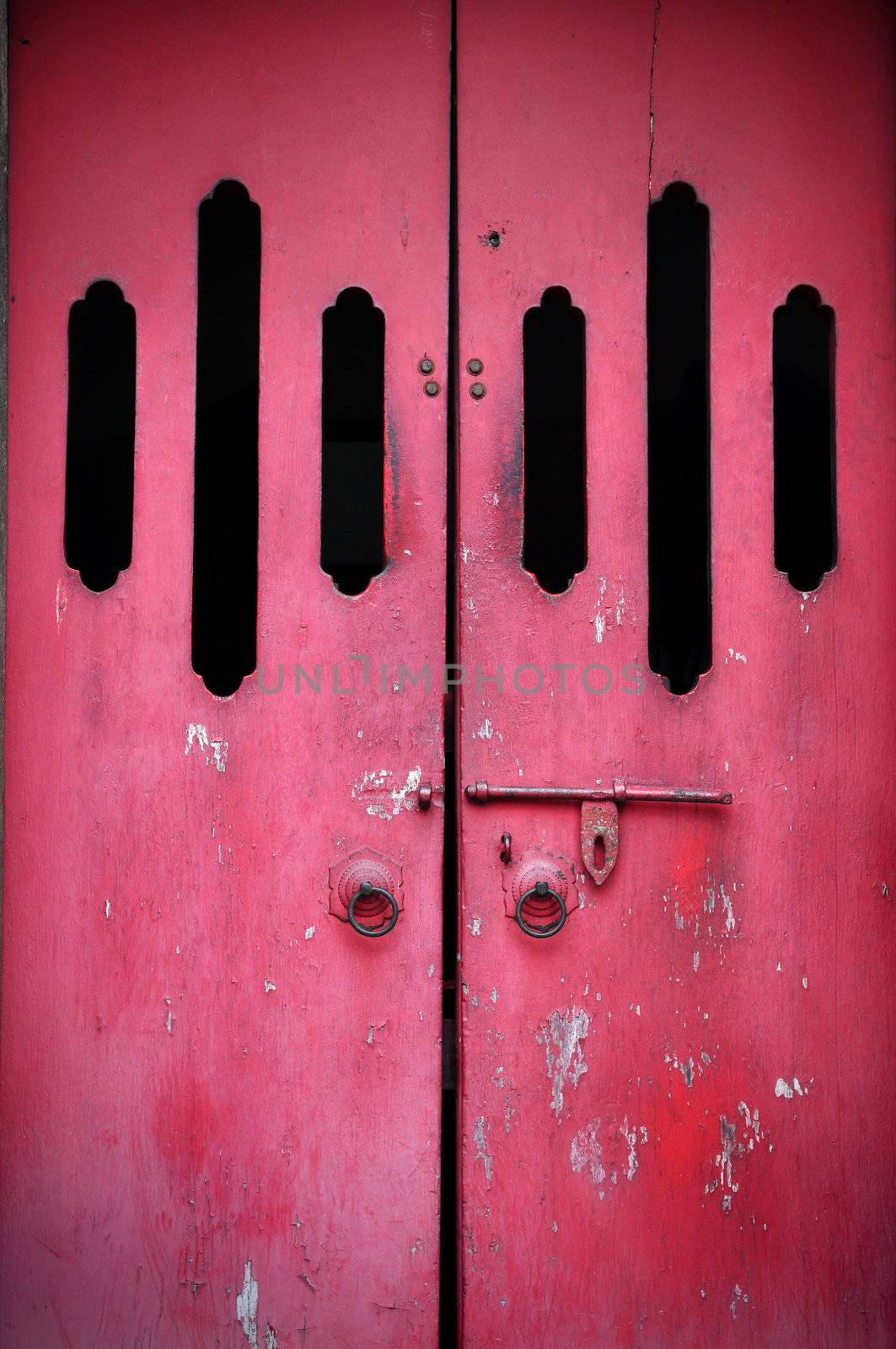 Red ancient door in Chinese Temple 
