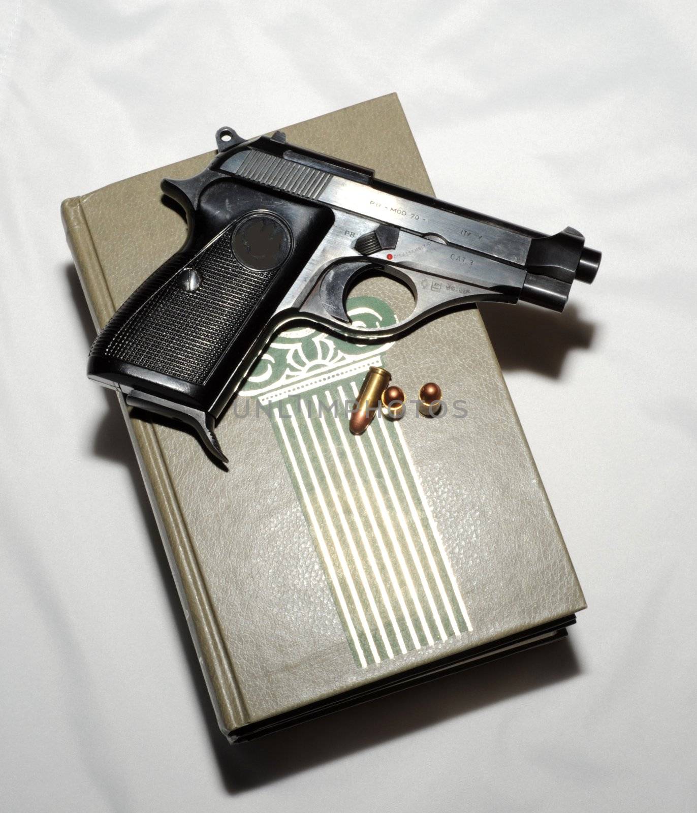 Pistol And Cartridges On  Book. 
Detective Story.
