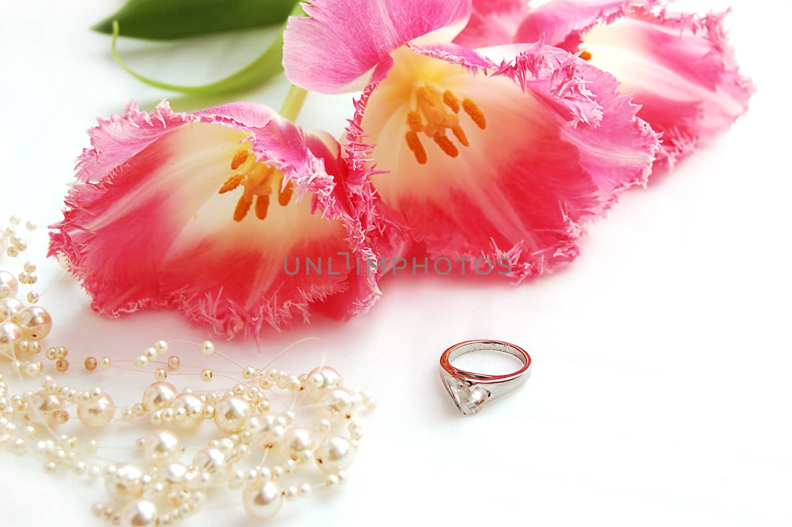 Pink tulips with ring and pearl jewelery