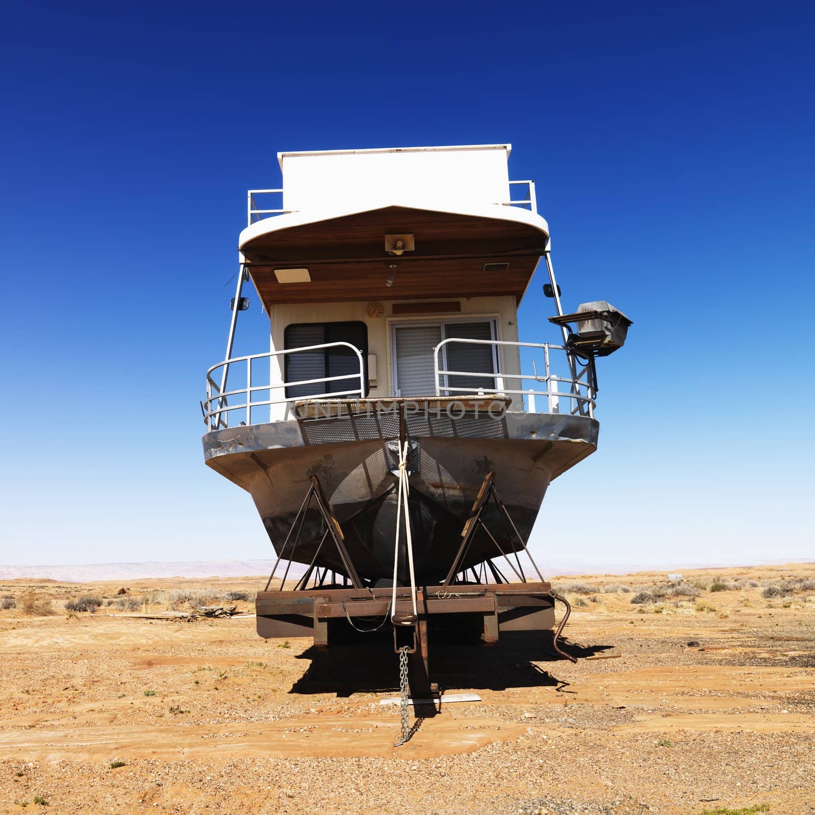 Houseboat in Arizona desert. by iofoto