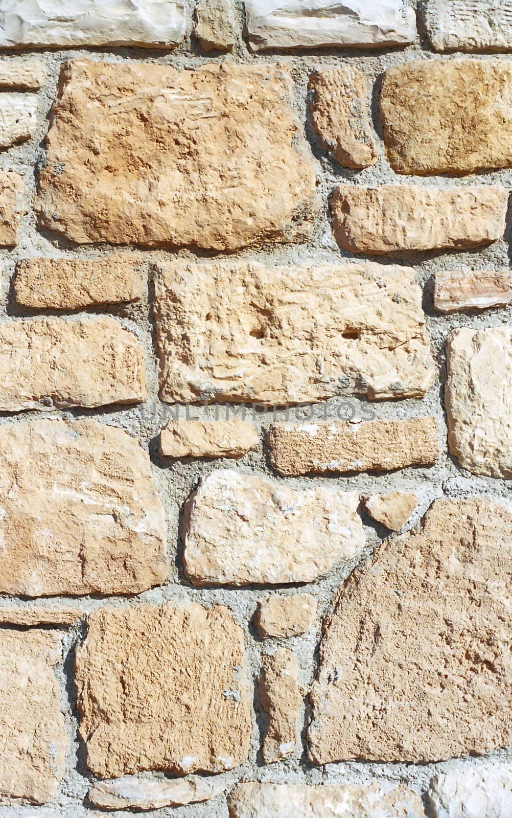 Yellow stone wall as background