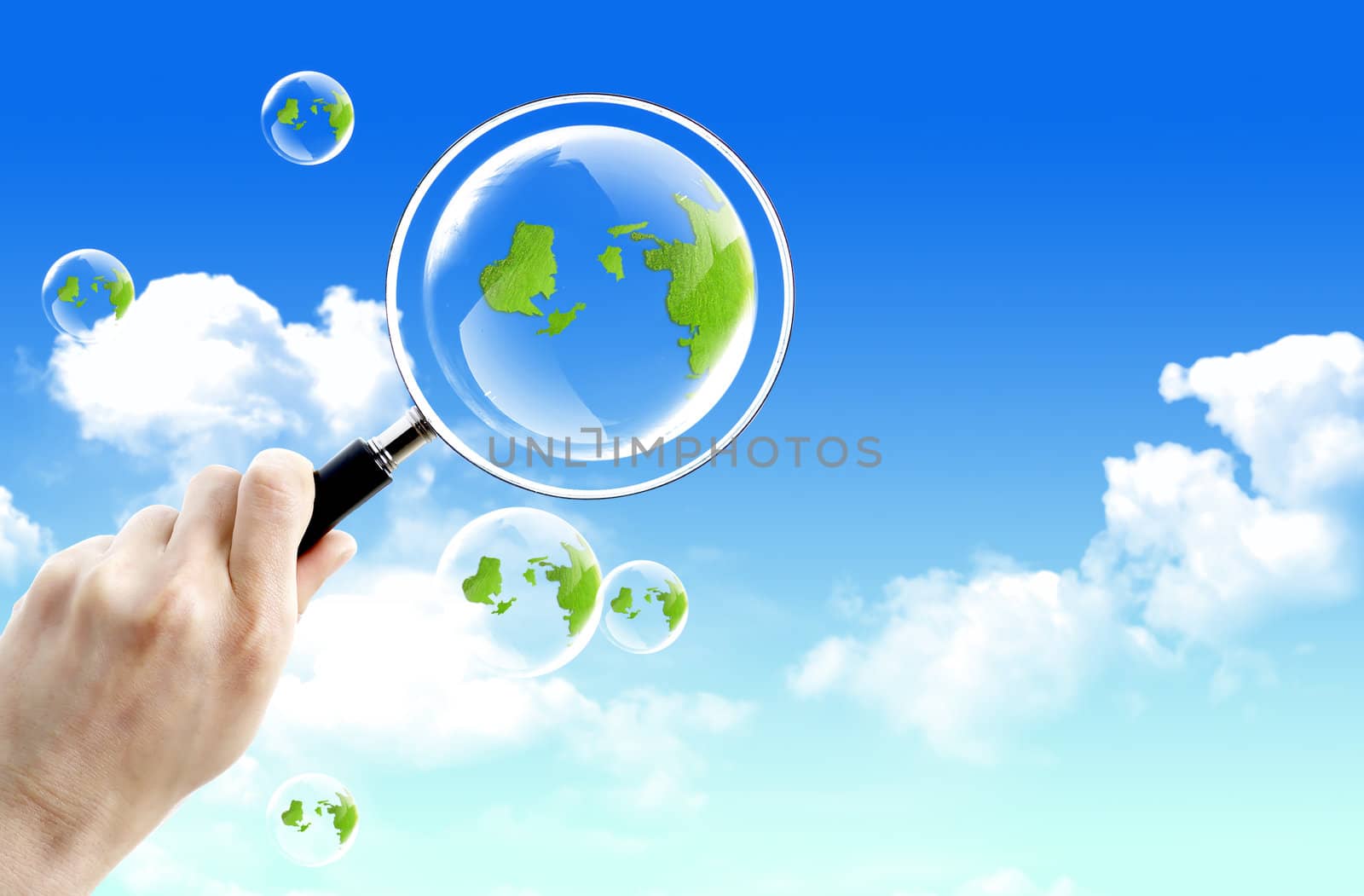 Eco concept : Magnifying glass and global by rufous