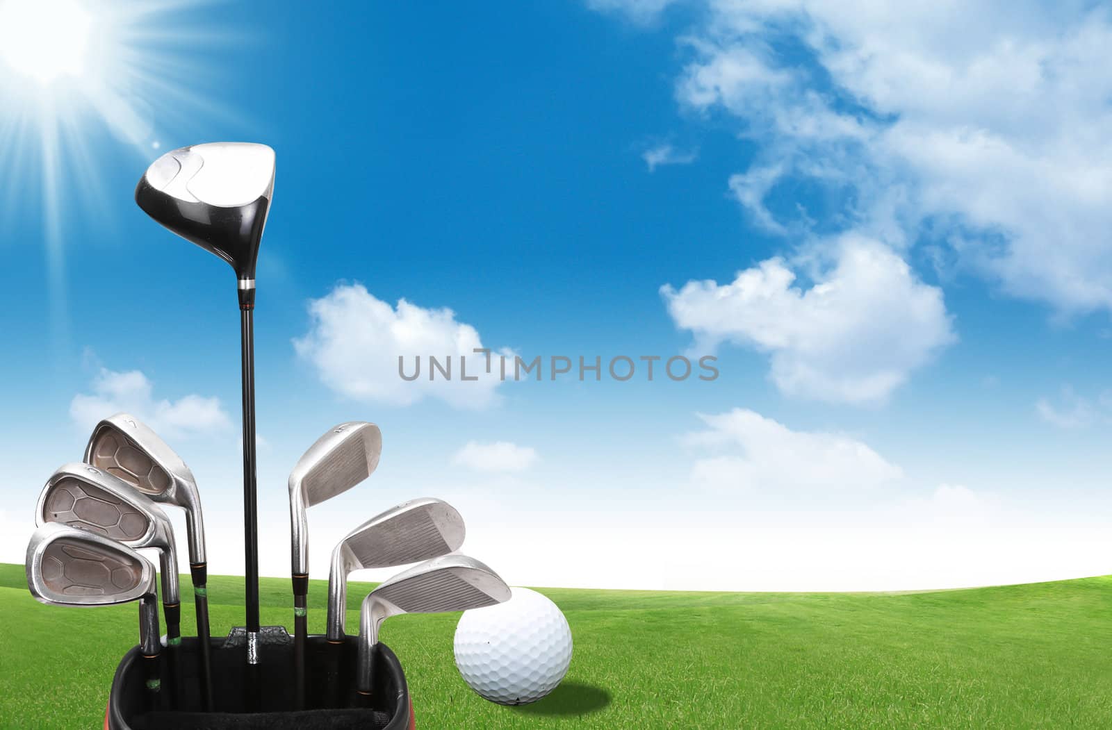A set up new golf clubs on a beautiful golf course by rufous
