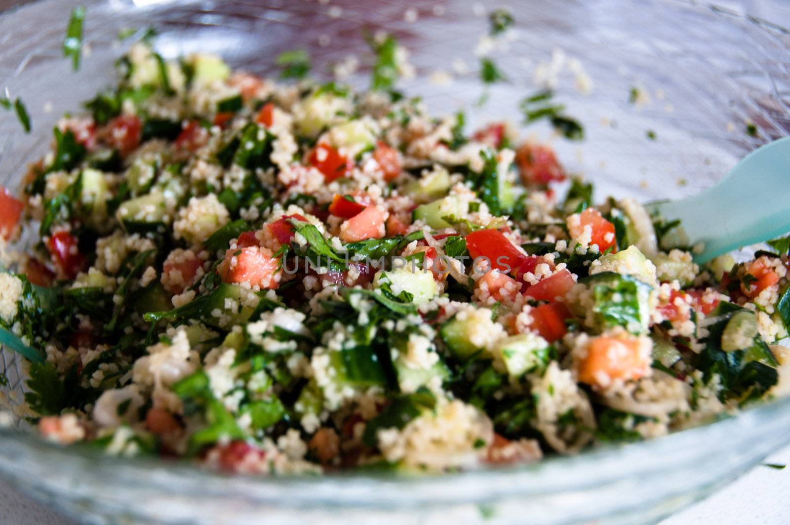 Traditional Arabian dish: Tabouleh salad with couscous, mint, tomatoes and parsley.