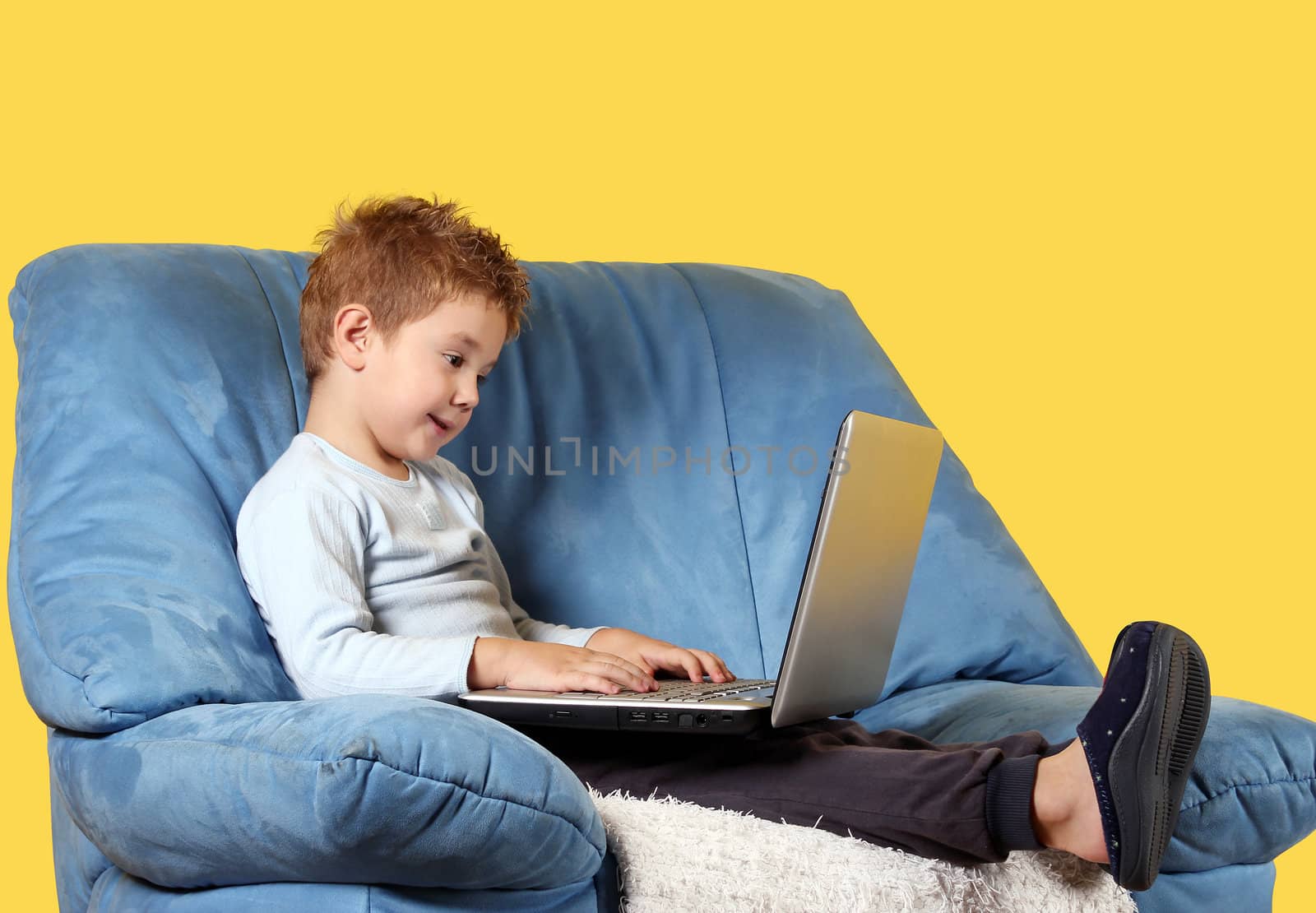boy with laptop by goce